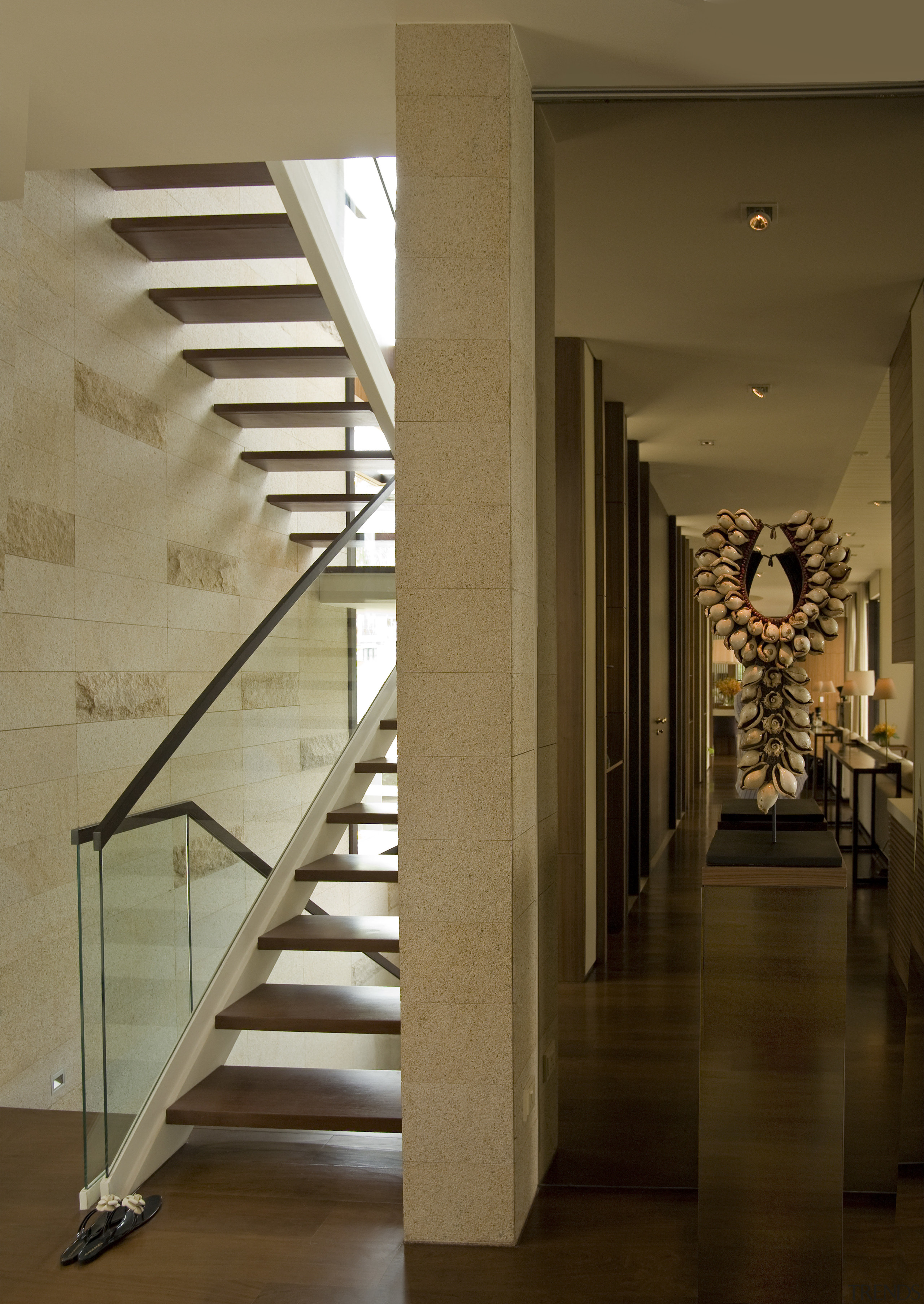 View of stairway with dark-stained timber steps, glass baluster, floor, flooring, handrail, home, interior design, stairs, structure, wood, brown