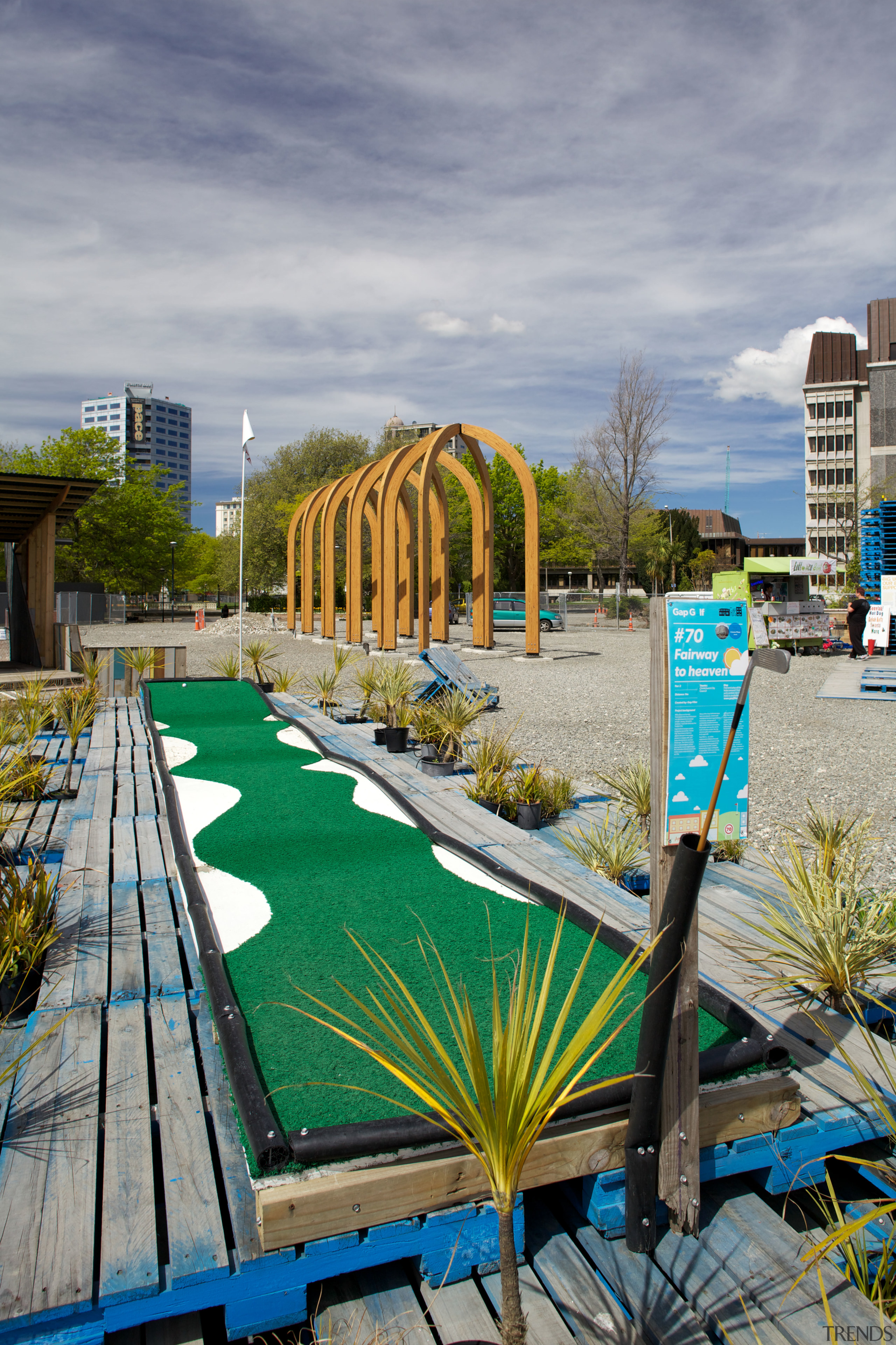 :The Arcades is a collaboration between Ryan Reynolds, grass, landscaping, leisure, outdoor structure, plant, real estate, sky, tree, water, gray