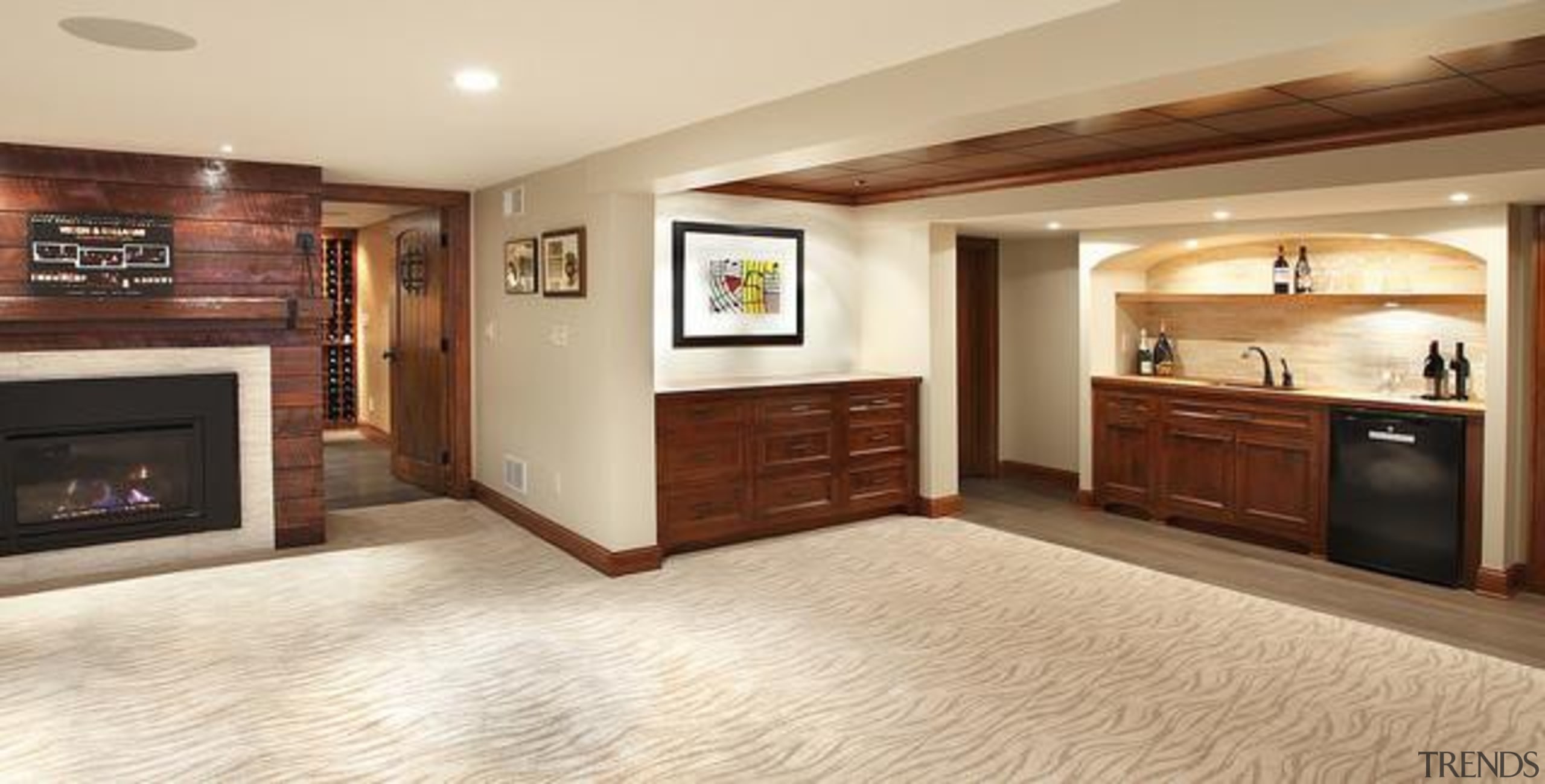 Because of its expansive and wide-open layout, a floor, flooring, hardwood, home, interior design, laminate flooring, living room, real estate, room, wood, wood flooring, orange, brown