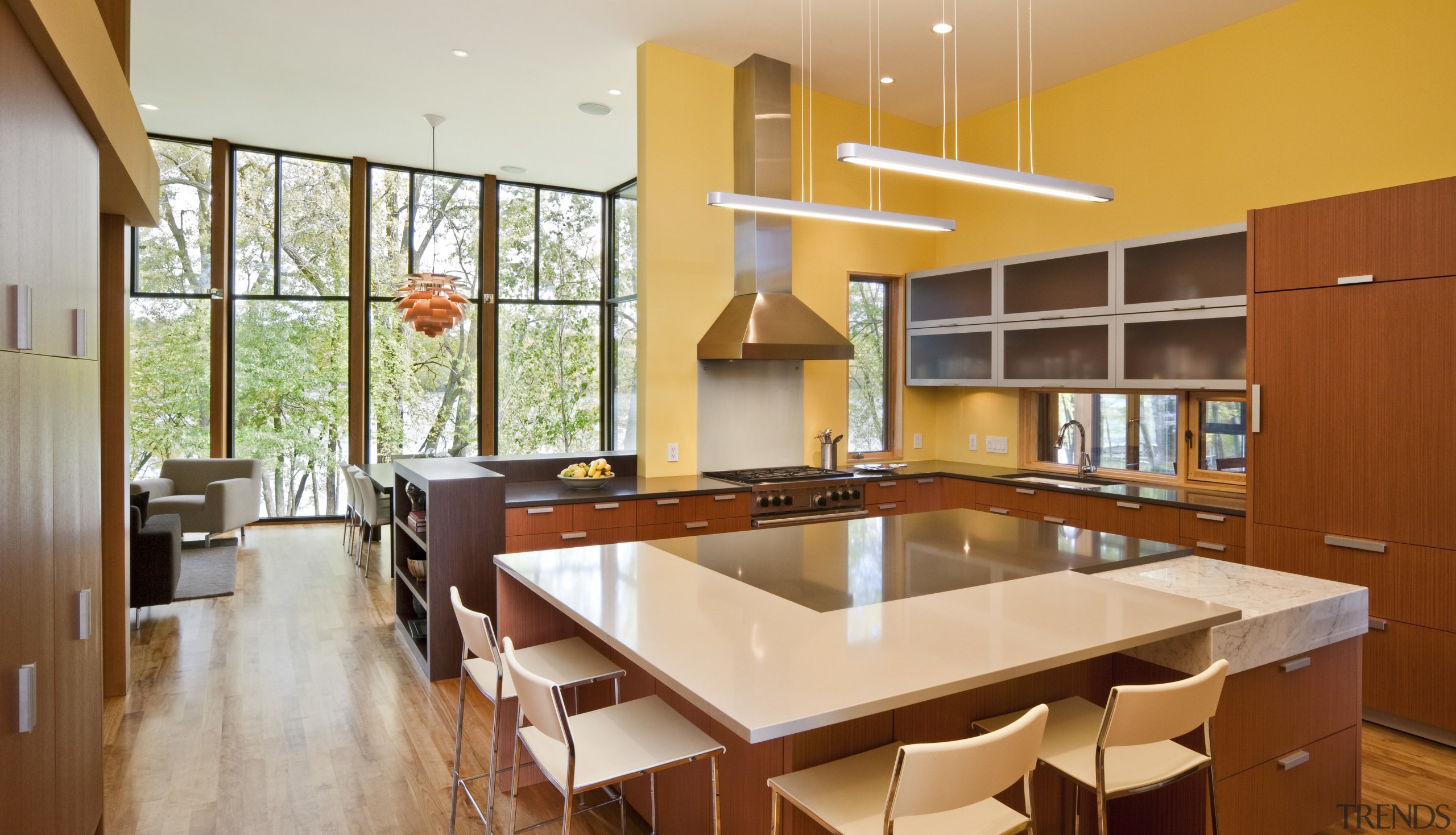 View of the kitchen featuring wenge and mahogany architecture, cabinetry, countertop, dining room, hardwood, interior design, kitchen, real estate, room, brown, orange