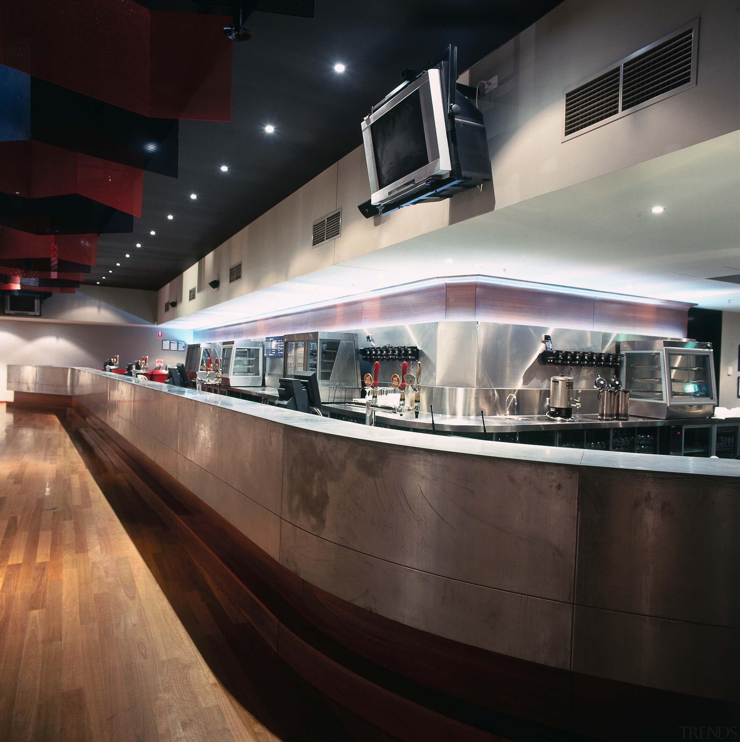 Bar area with long curved counter and bulkhead architecture, interior design, black