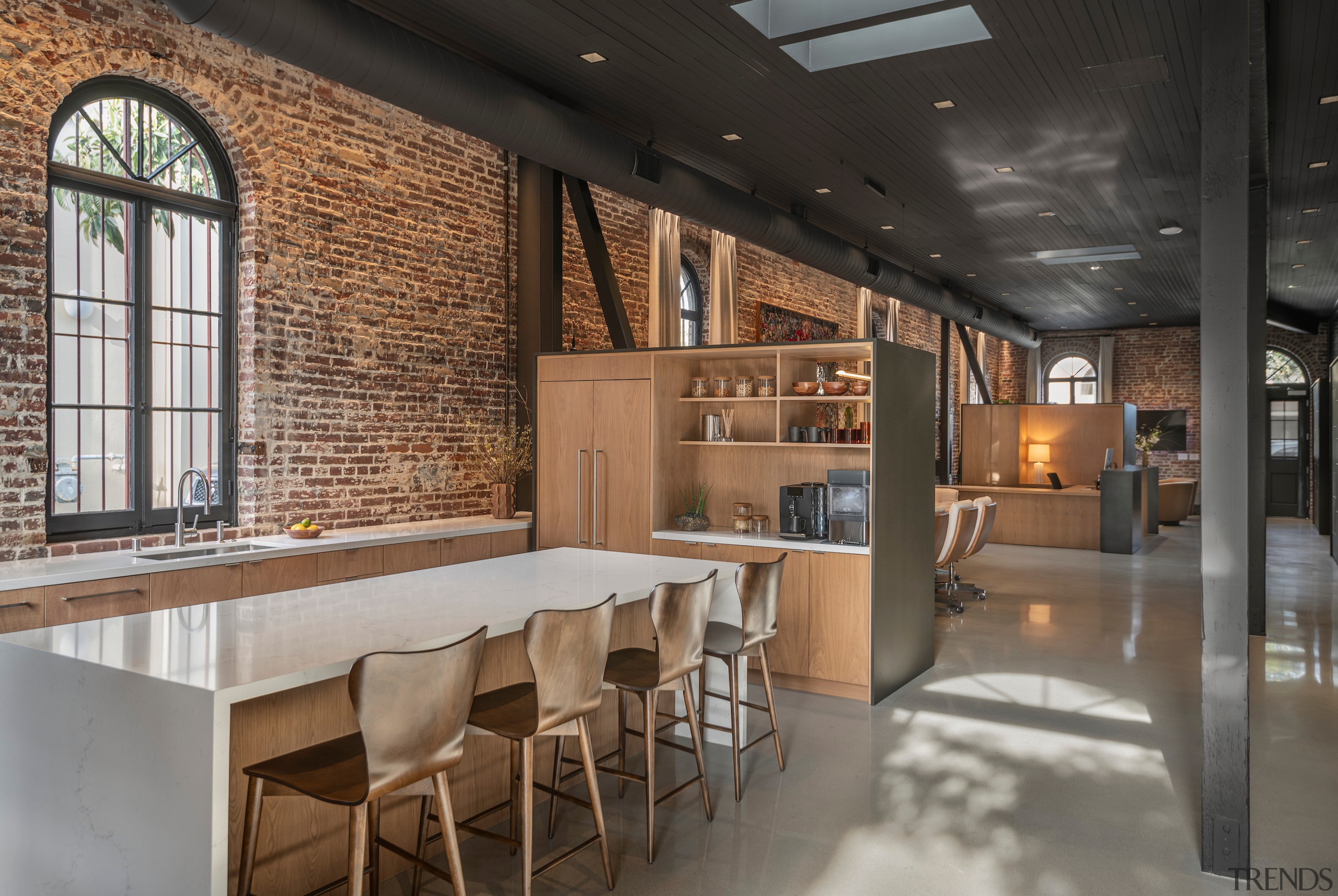 Existing windows and skylights flood the lounge and 