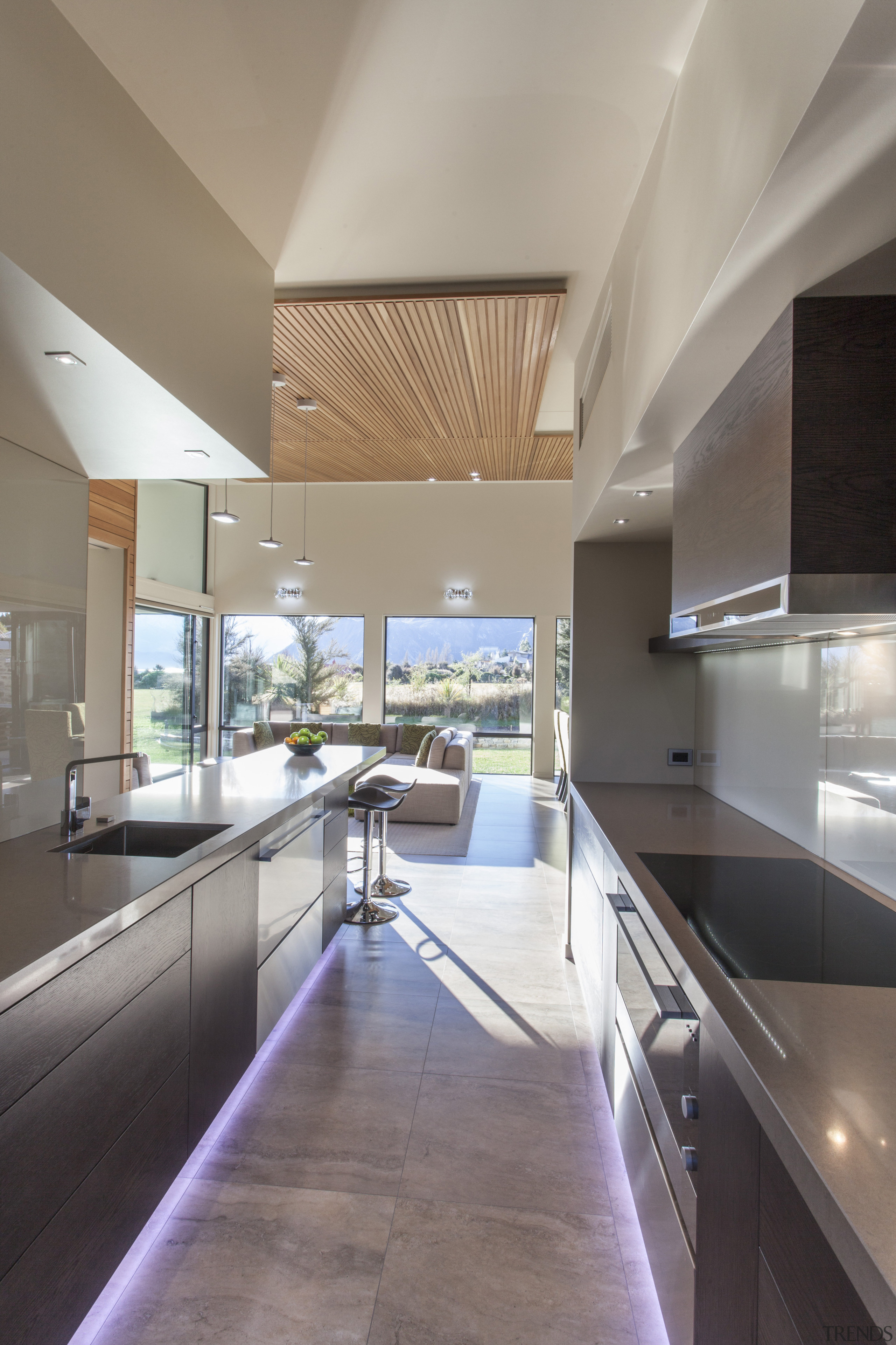 The kitchen of this country house includes a architecture, ceiling, countertop, daylighting, estate, floor, house, interior design, kitchen, real estate, gray