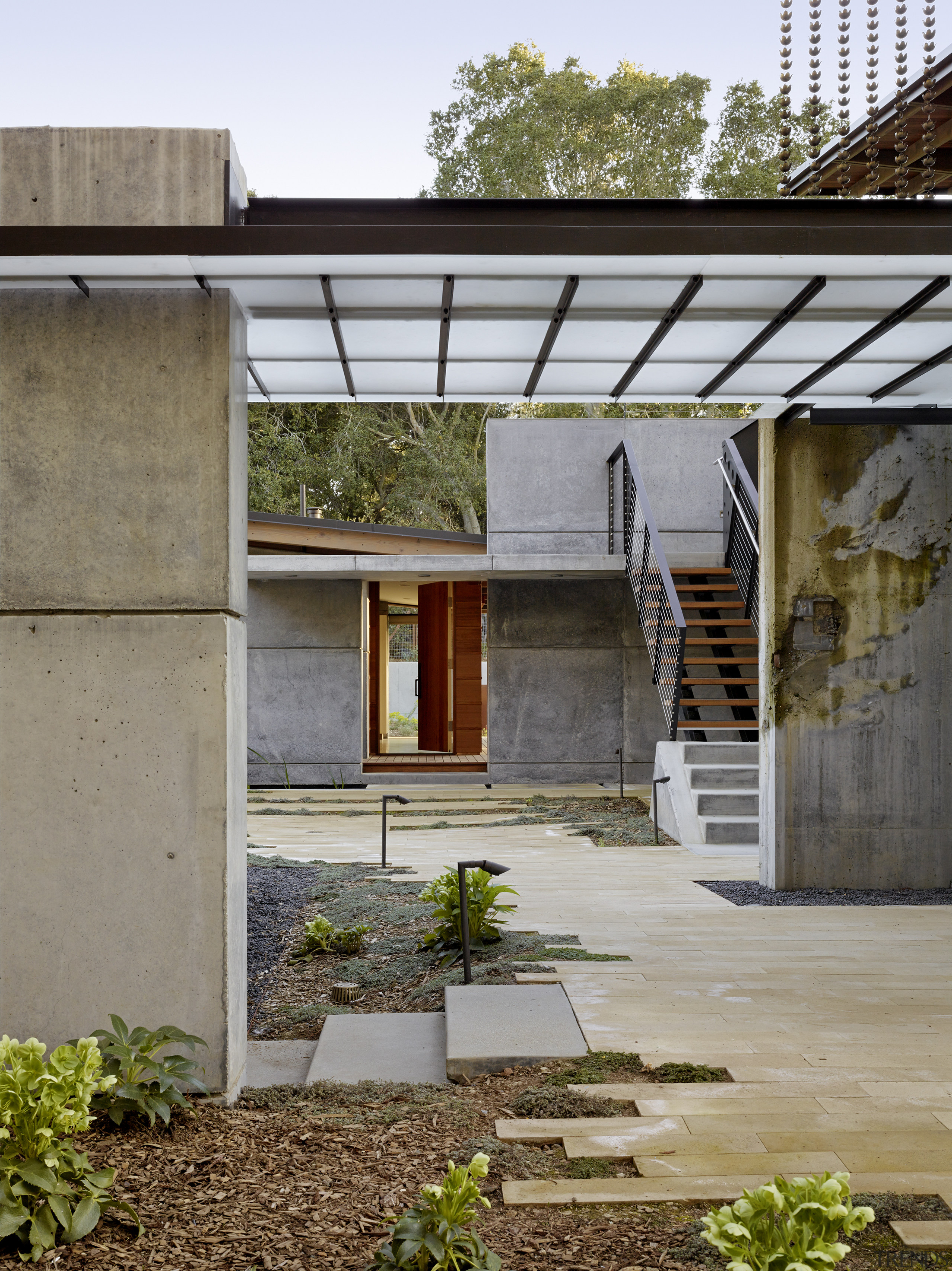 ​​​​​​​Water from a butterfly roof is channelled down architecture, courtyard, house, home, residential, FuTung Cheng,  Cheng Design