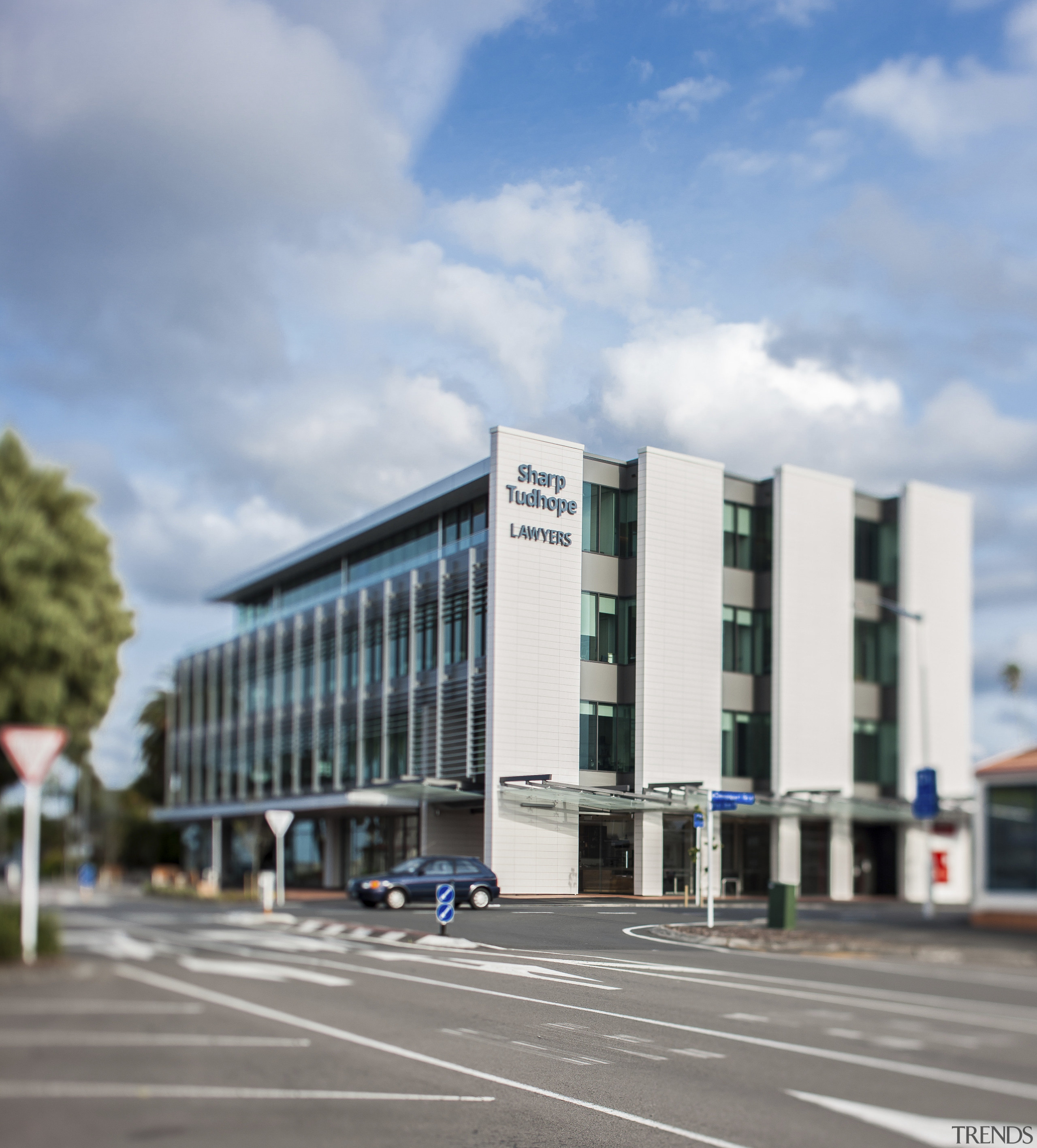 The first office block with a Green Star architecture, building, commercial building, corporate headquarters, headquarters, infrastructure, metropolitan area, mixed use, sky, gray