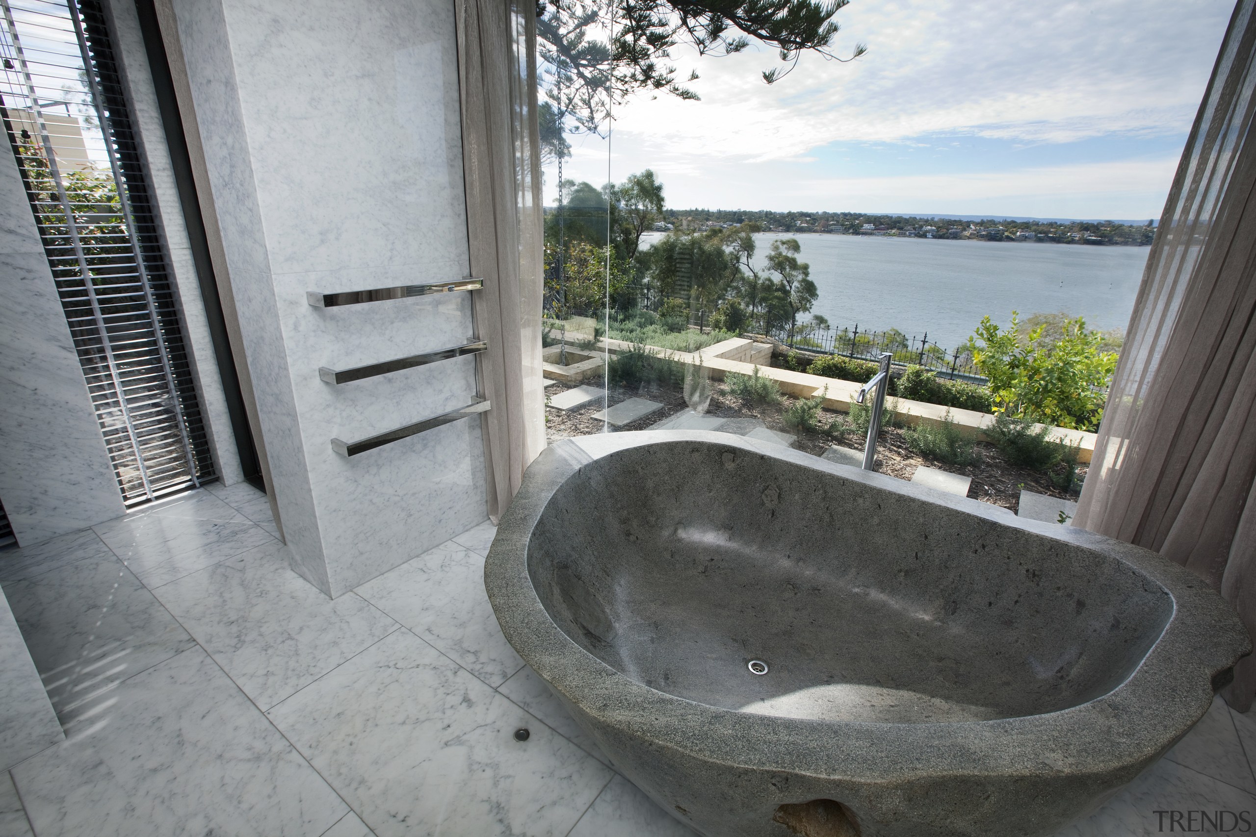 This master suite in a contemporary new house bathtub, estate, property, real estate, gray