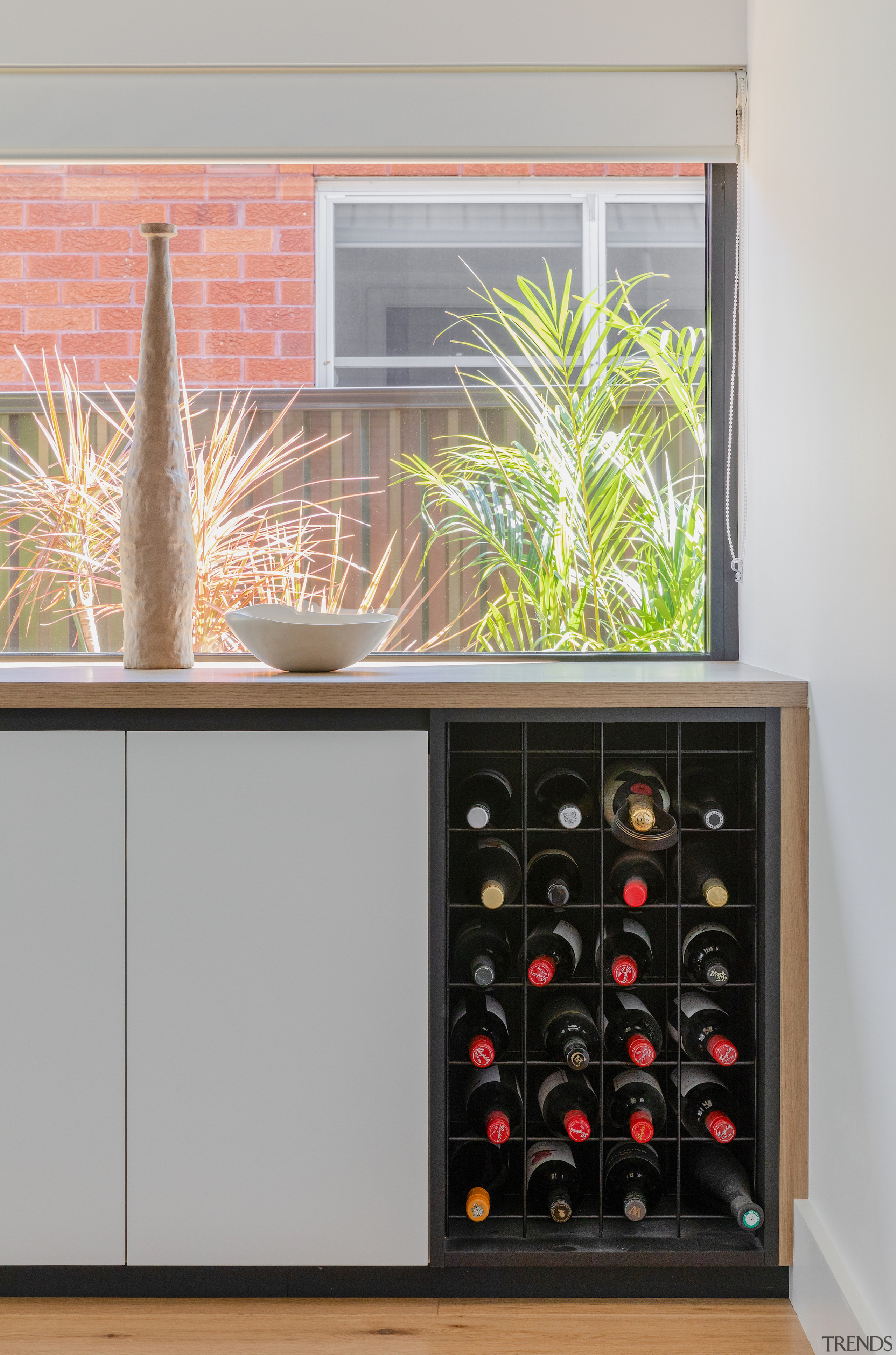 Dining room wine storage. - A conduit for 