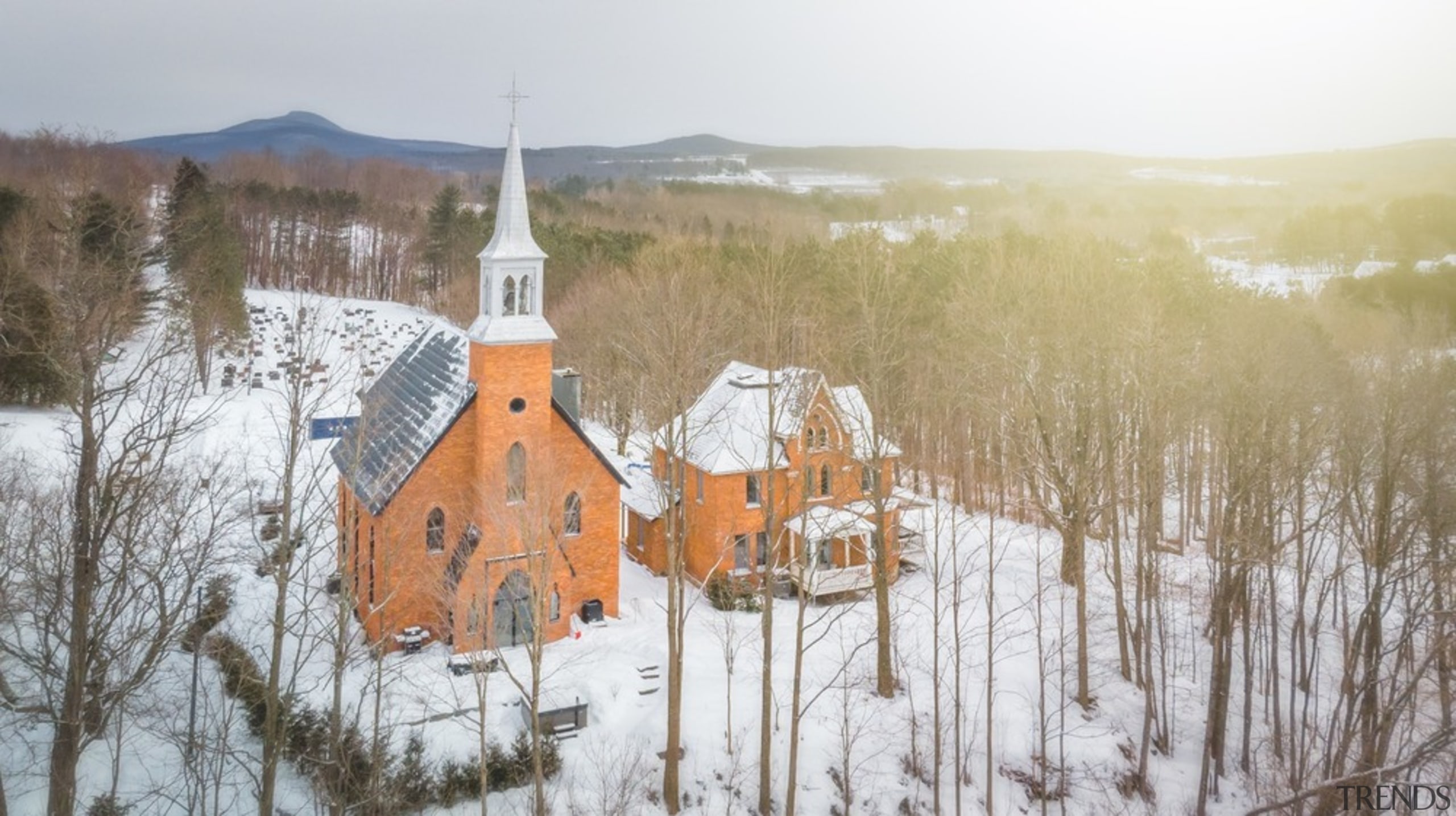 Neogothic architecture with contemporary character architecture, atmospheric phenomenon, building, chapel, church, freezing, geological phenomenon, place of worship, rural area, snow, steeple, winter, white