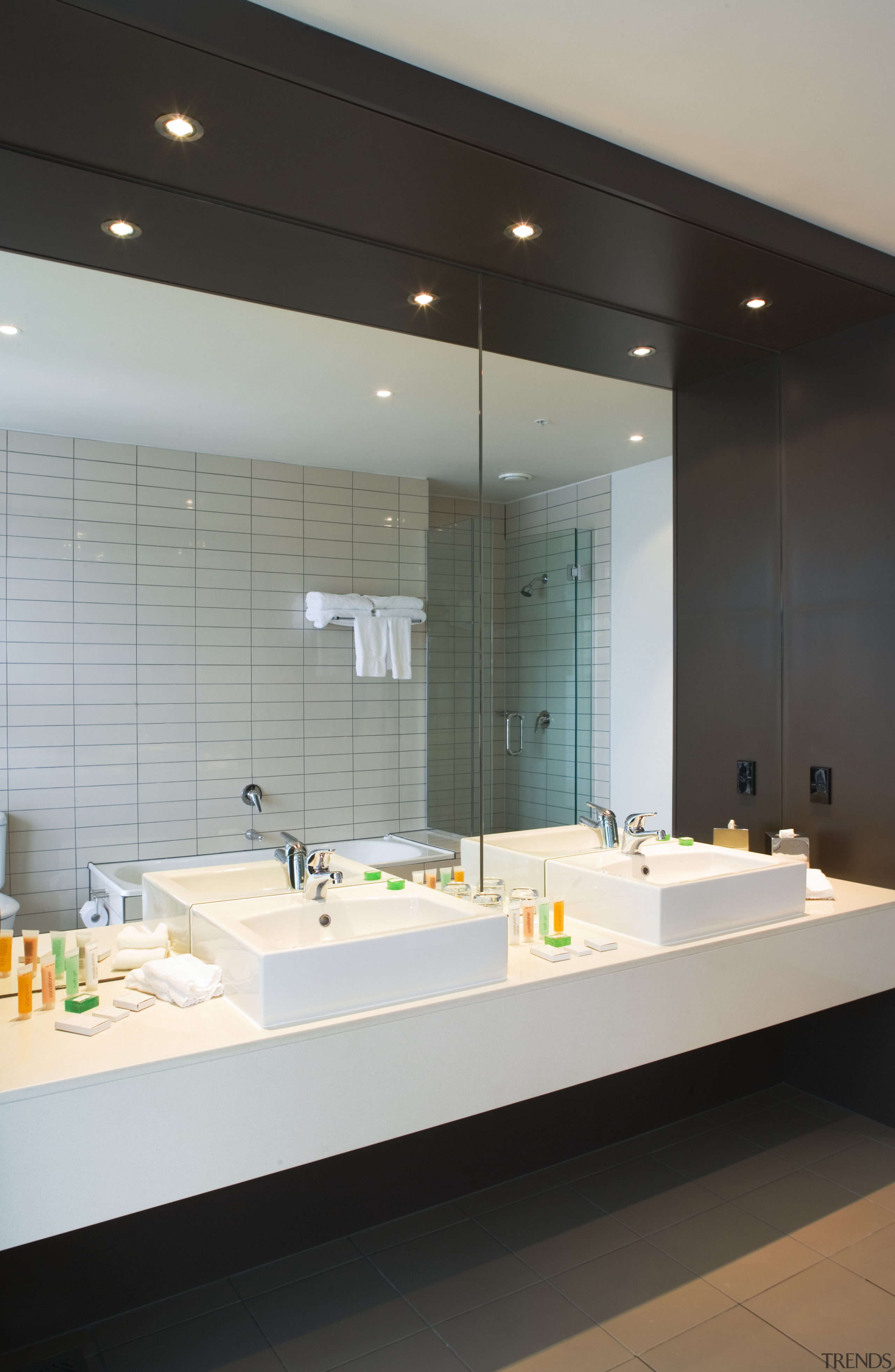 Quest rooms feature fully equipped Kitchenettes finished in architecture, bathroom, ceiling, interior design, room, sink, gray, black