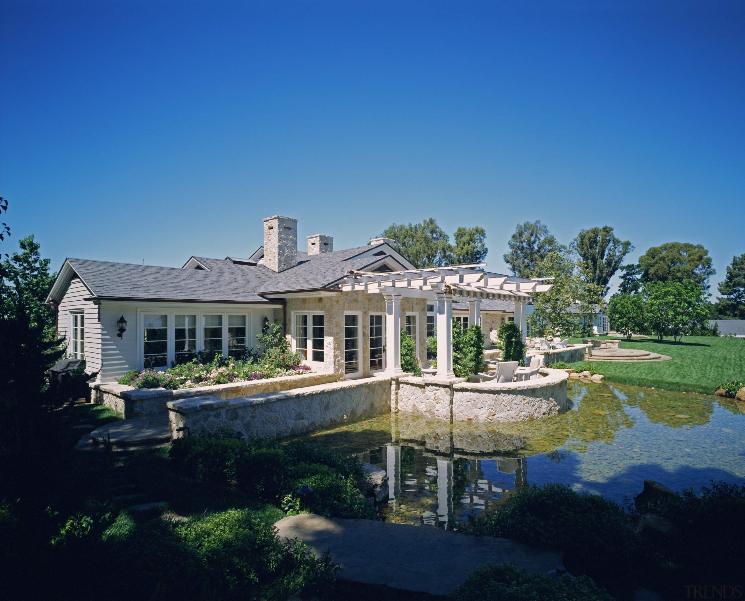 View of pond &amp; gardens - View of cottage, daytime, estate, home, house, landscape, mansion, property, real estate, reflection, residential area, sky, suburb, tree, villa, water, blue