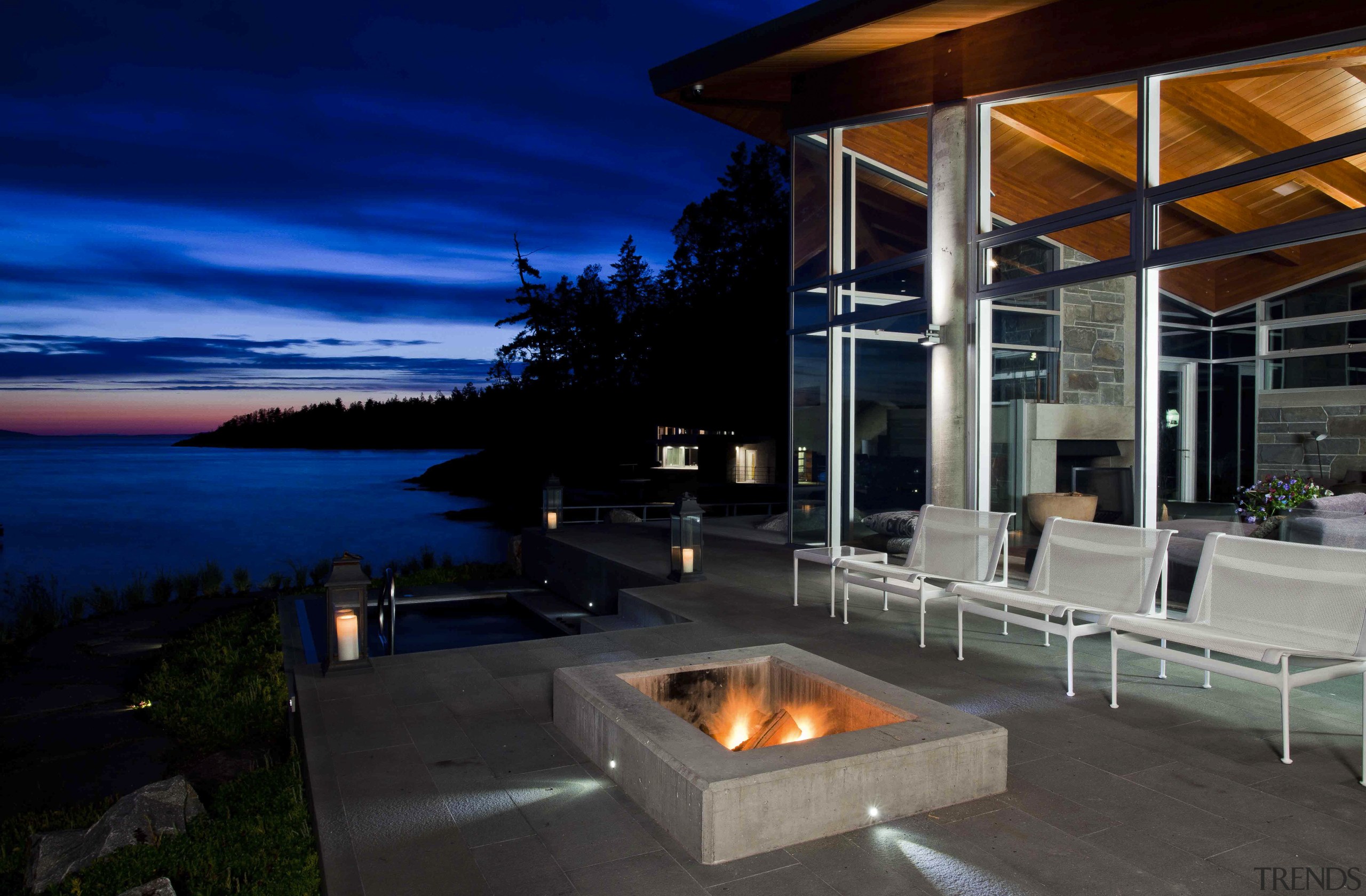 Exterior night shot of patio area. - Exterior estate, home, house, interior design, landscape lighting, lighting, patio, property, real estate, resort, black, blue