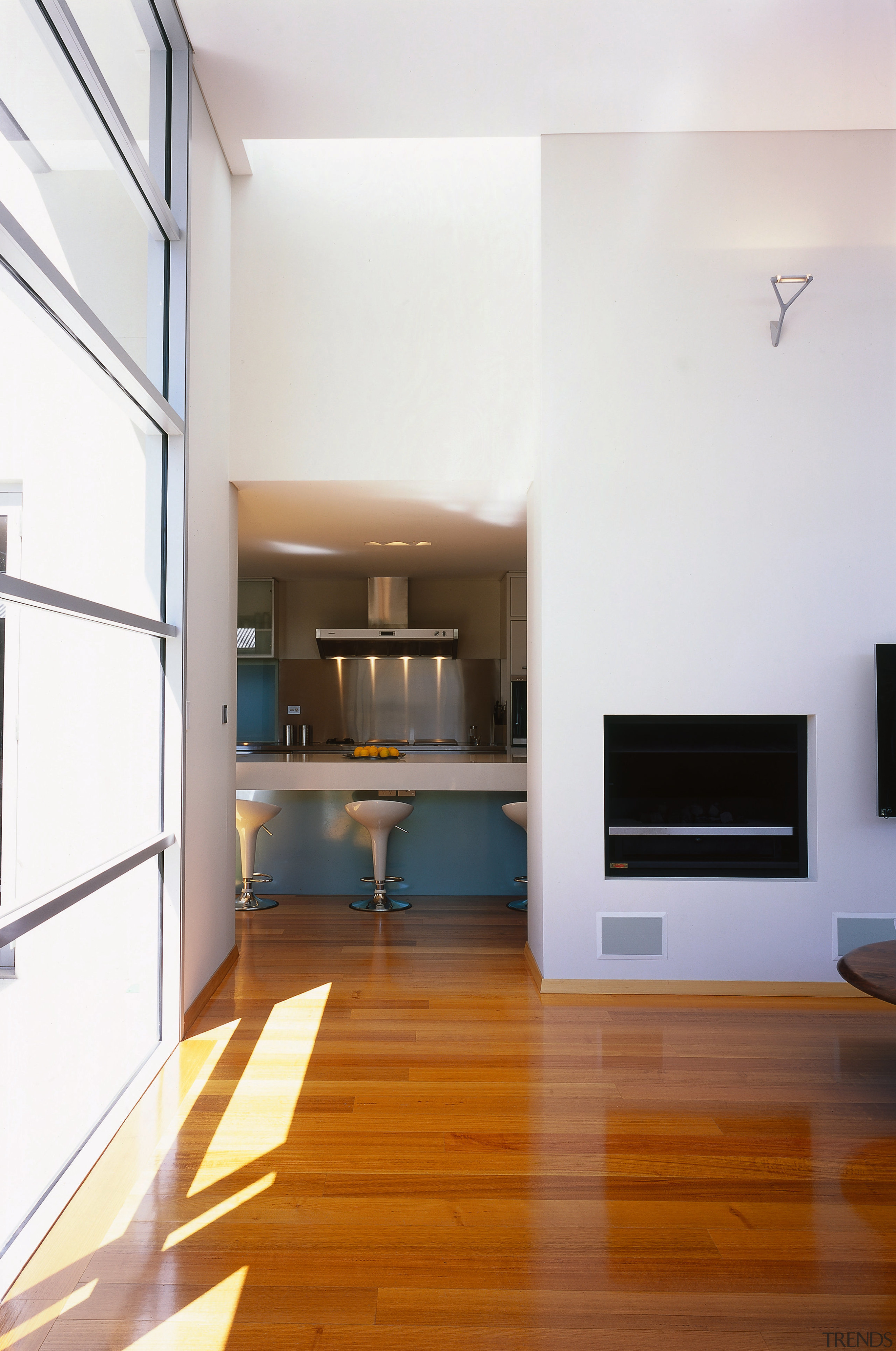 The view from the living area through to architecture, ceiling, daylighting, floor, flooring, hardwood, house, interior design, laminate flooring, living room, loft, room, wall, wood, wood flooring, white