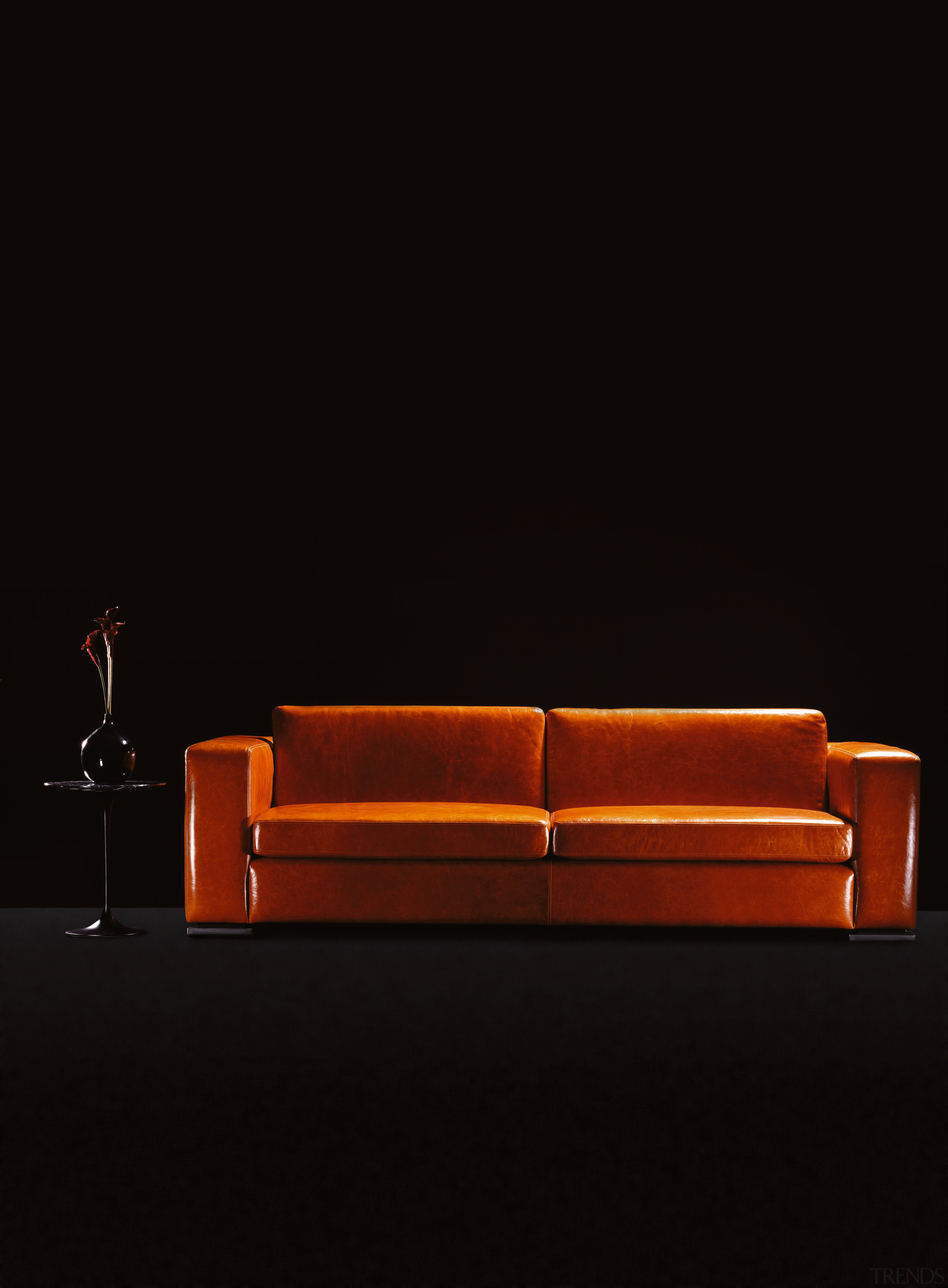 view of the bobcat sofa in Mango leather chaise longue, couch, furniture, orange, product design, sofa bed, table, black