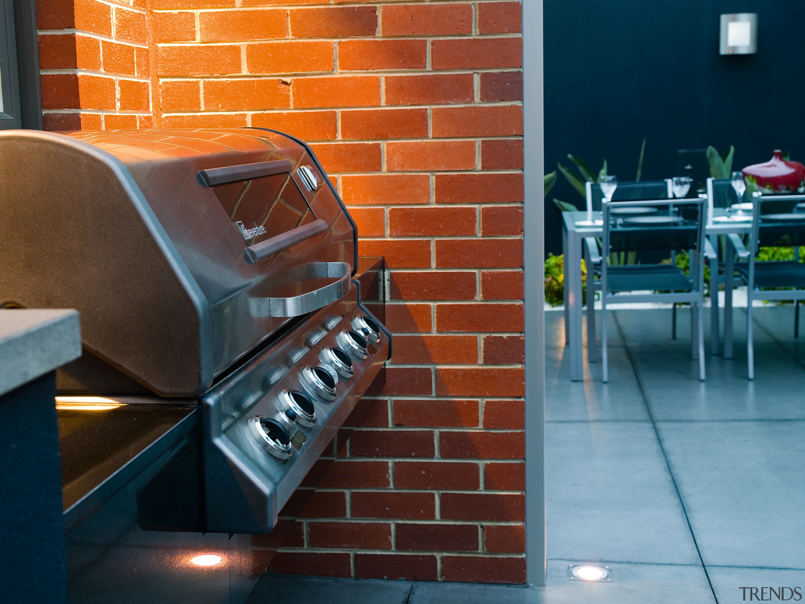 view of the everdure stainless steel outdoor barbecue countertop, floor, flooring