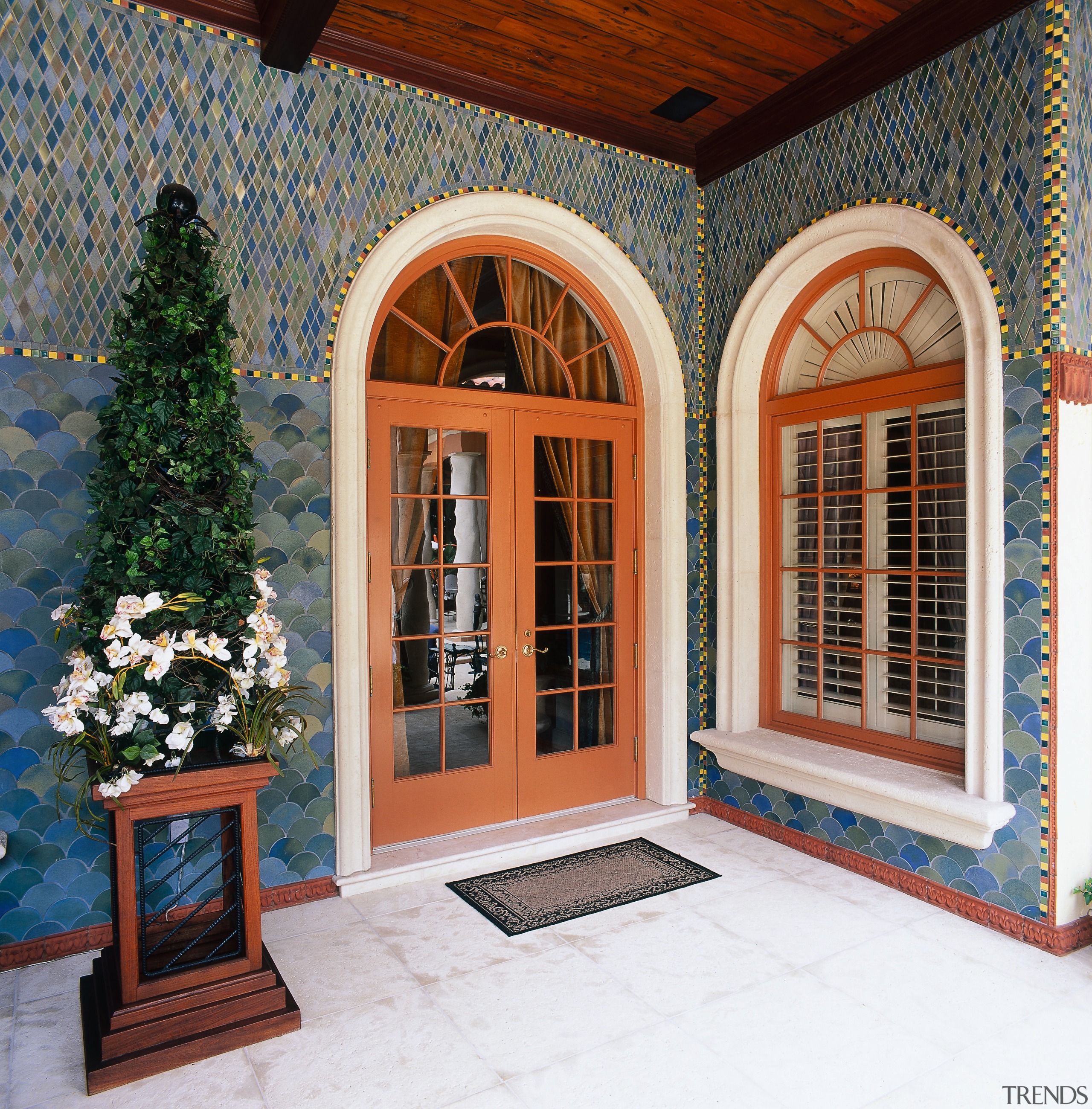 view of the tiles that are laid in door, facade, home, window, gray