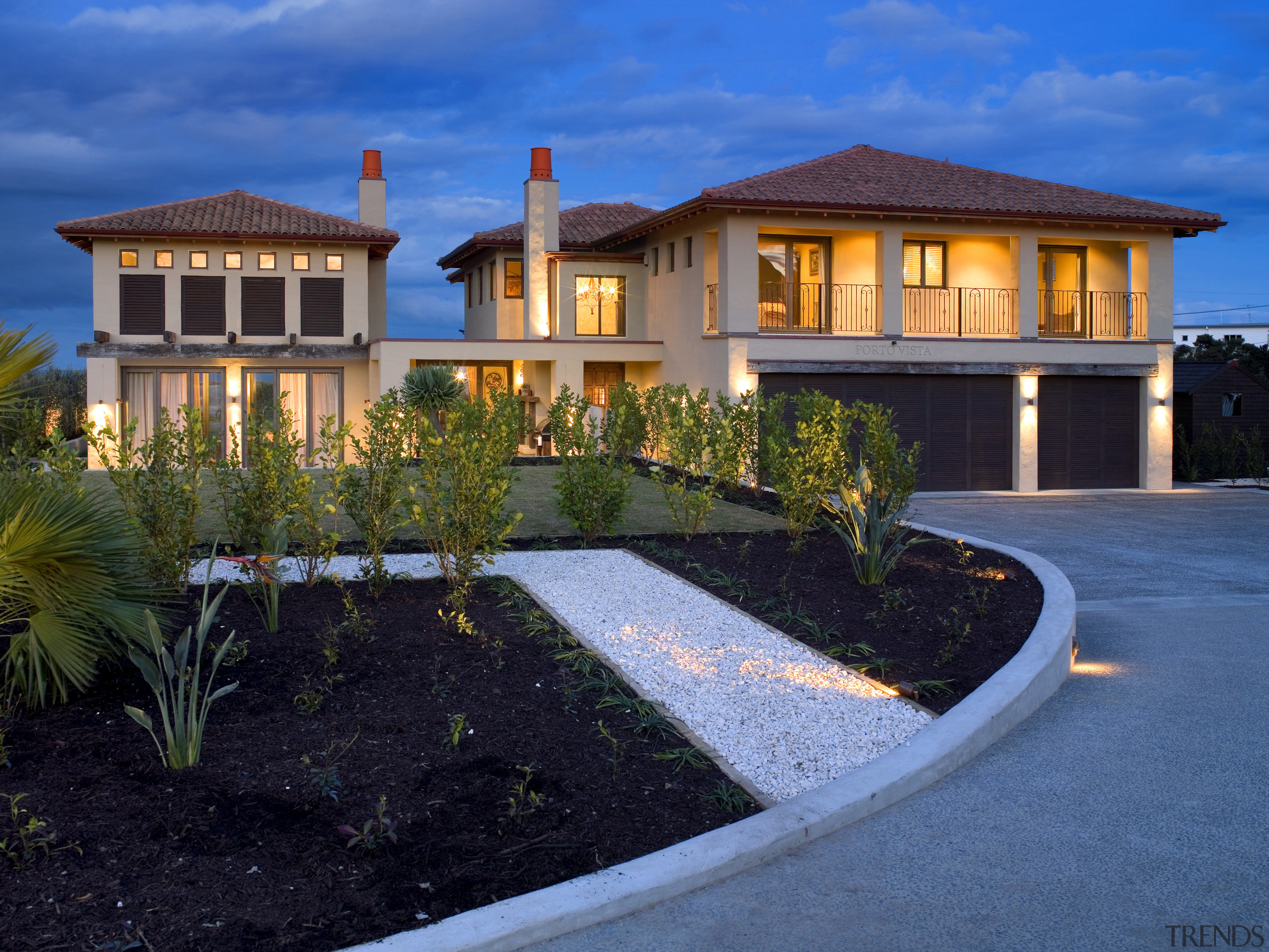 These homes won Gold Awards in the 2007 elevation, estate, facade, home, house, landscape, landscape lighting, landscaping, lighting, mansion, property, real estate, residential area, sky, villa, window, blue, black