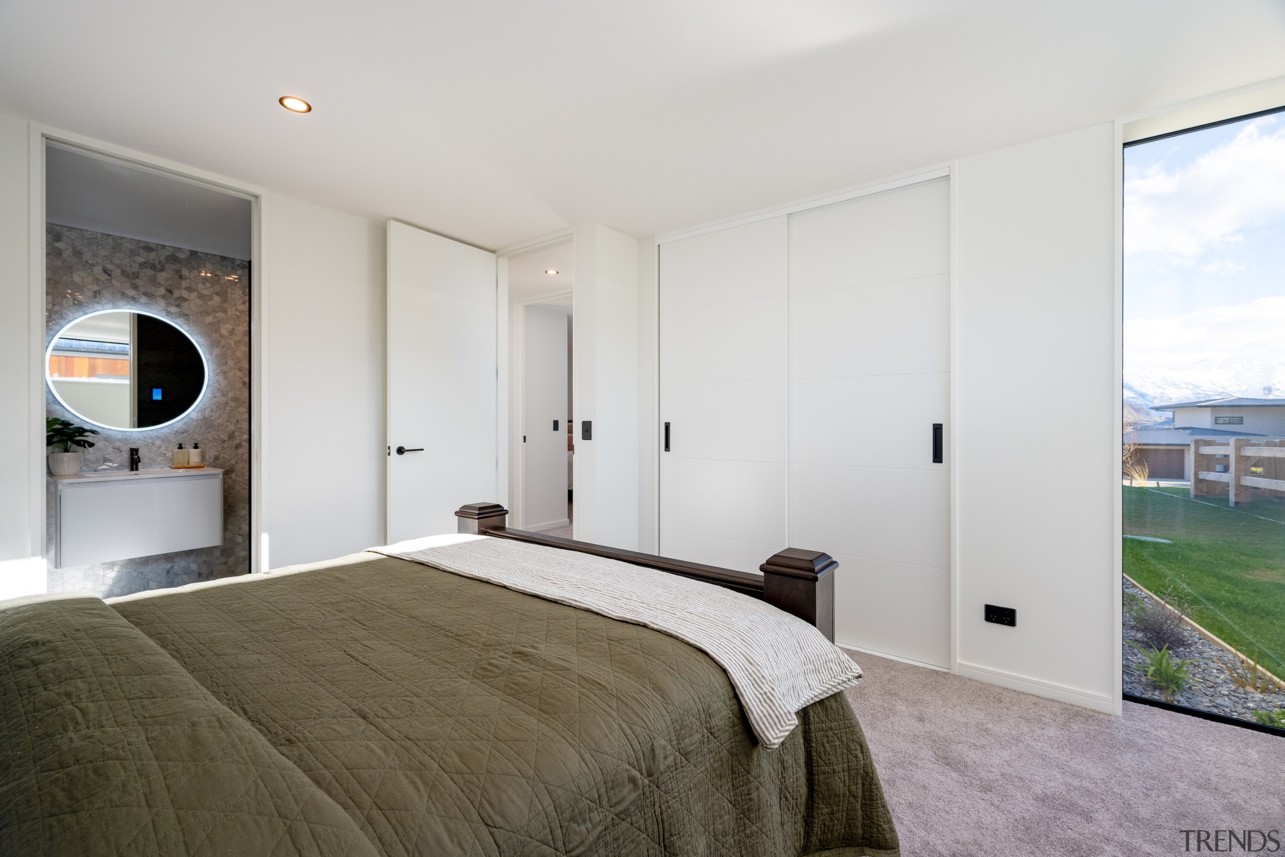 Ground floor bedroom with built-in storage. 