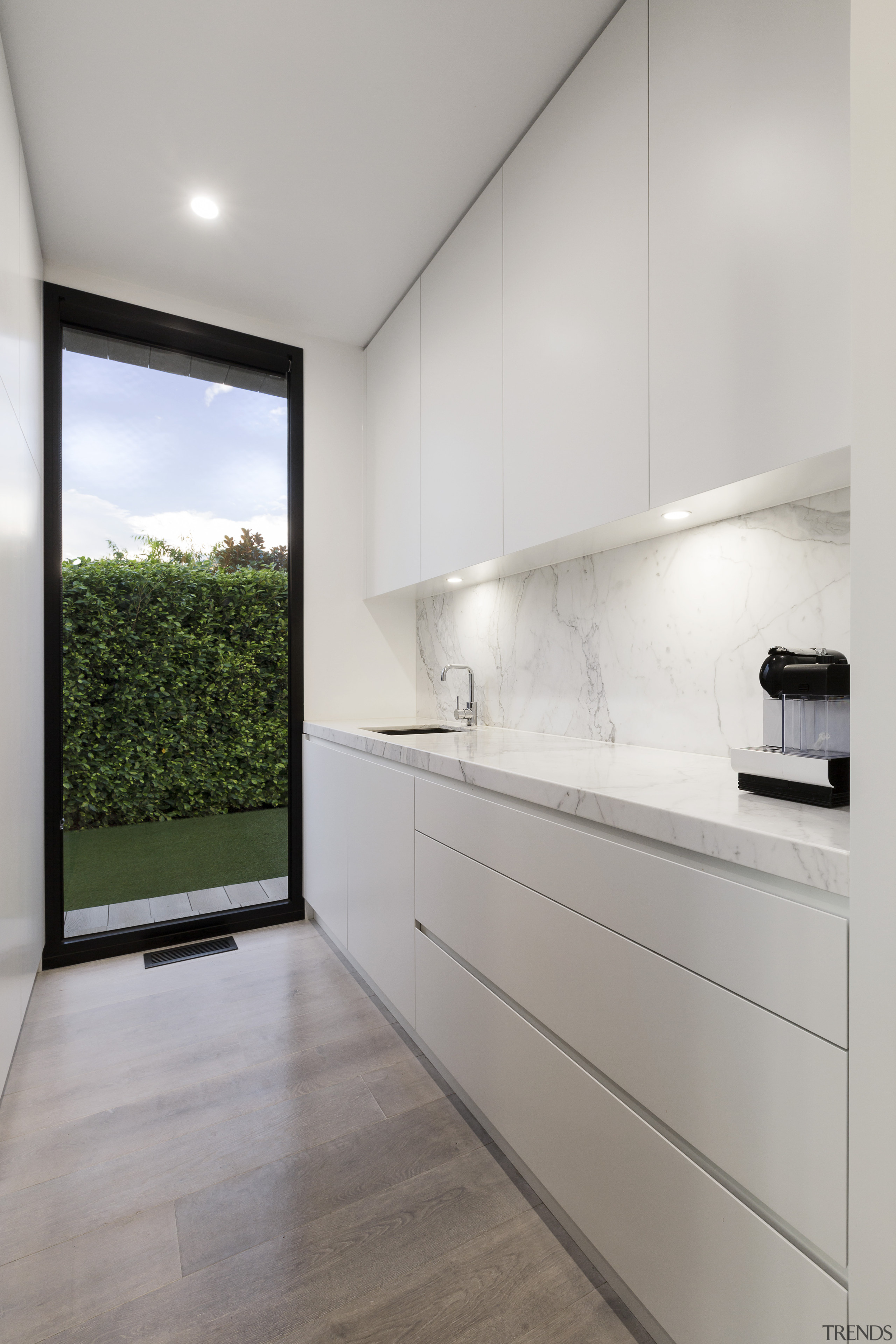 ​​​​​​​On this modernising renovation by architect Linda Simons countertop, house, interior design, kitchen, cabinetry, white, LSA Architects