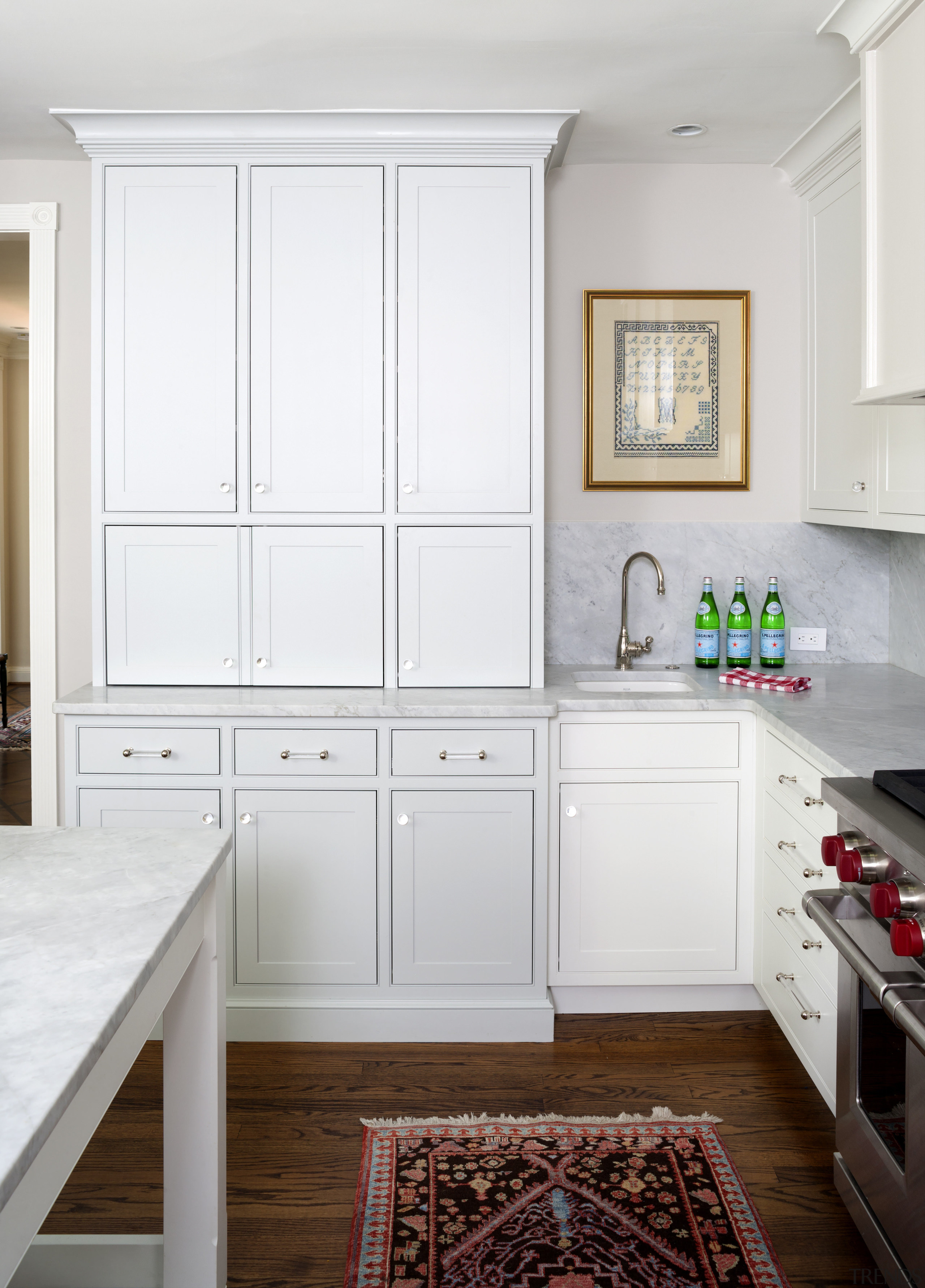 This above-counter cabinet is in a light silver, cabinetry, countertop, cuisine classique, floor, furniture, home, home appliance, interior design, kitchen, room, window, white