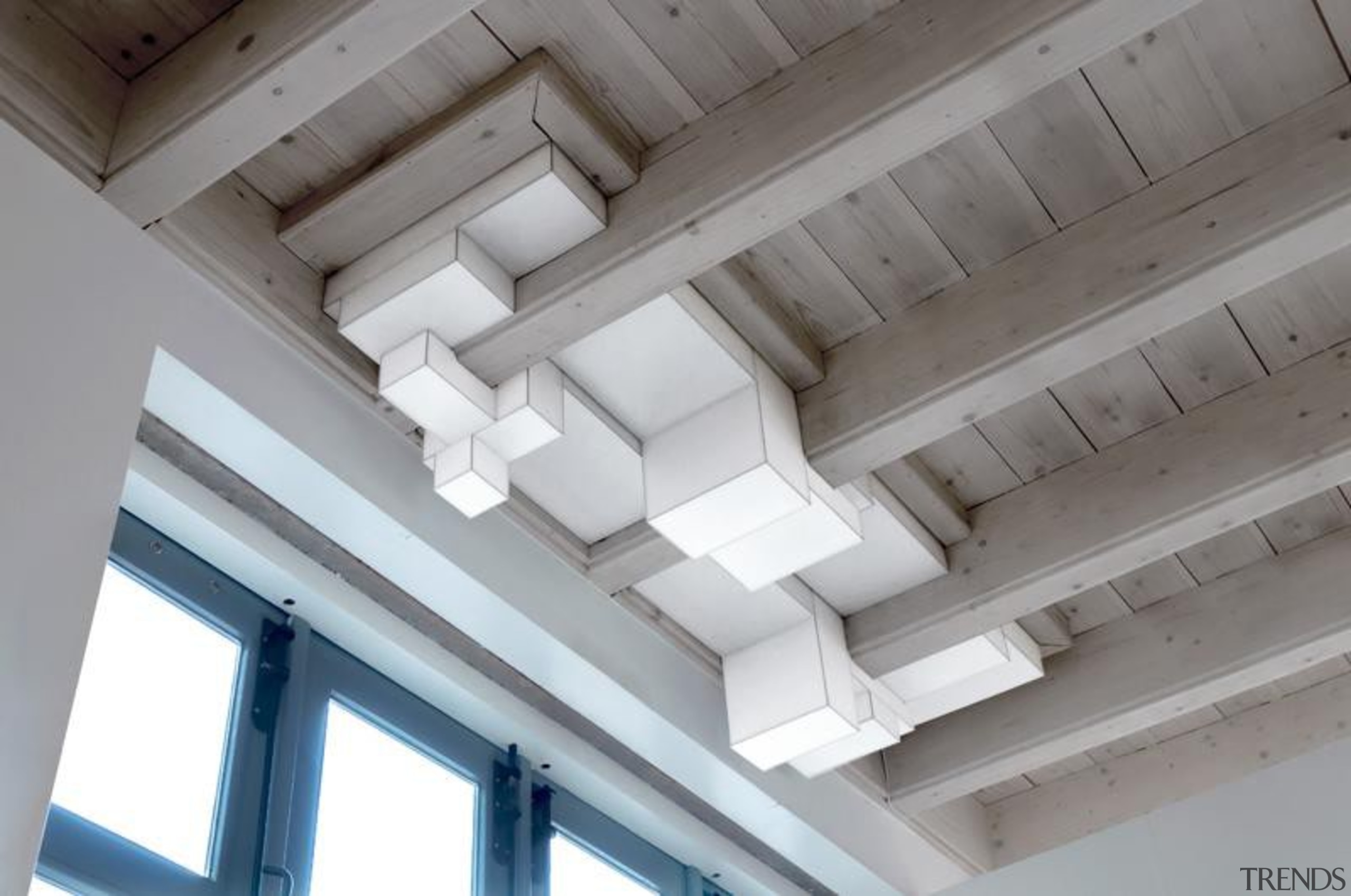 These clean-lined lampshades elegantly merge sculpture and illumination.What architecture, beam, ceiling, daylighting, daytime, light, line, roof, structure, window, gray