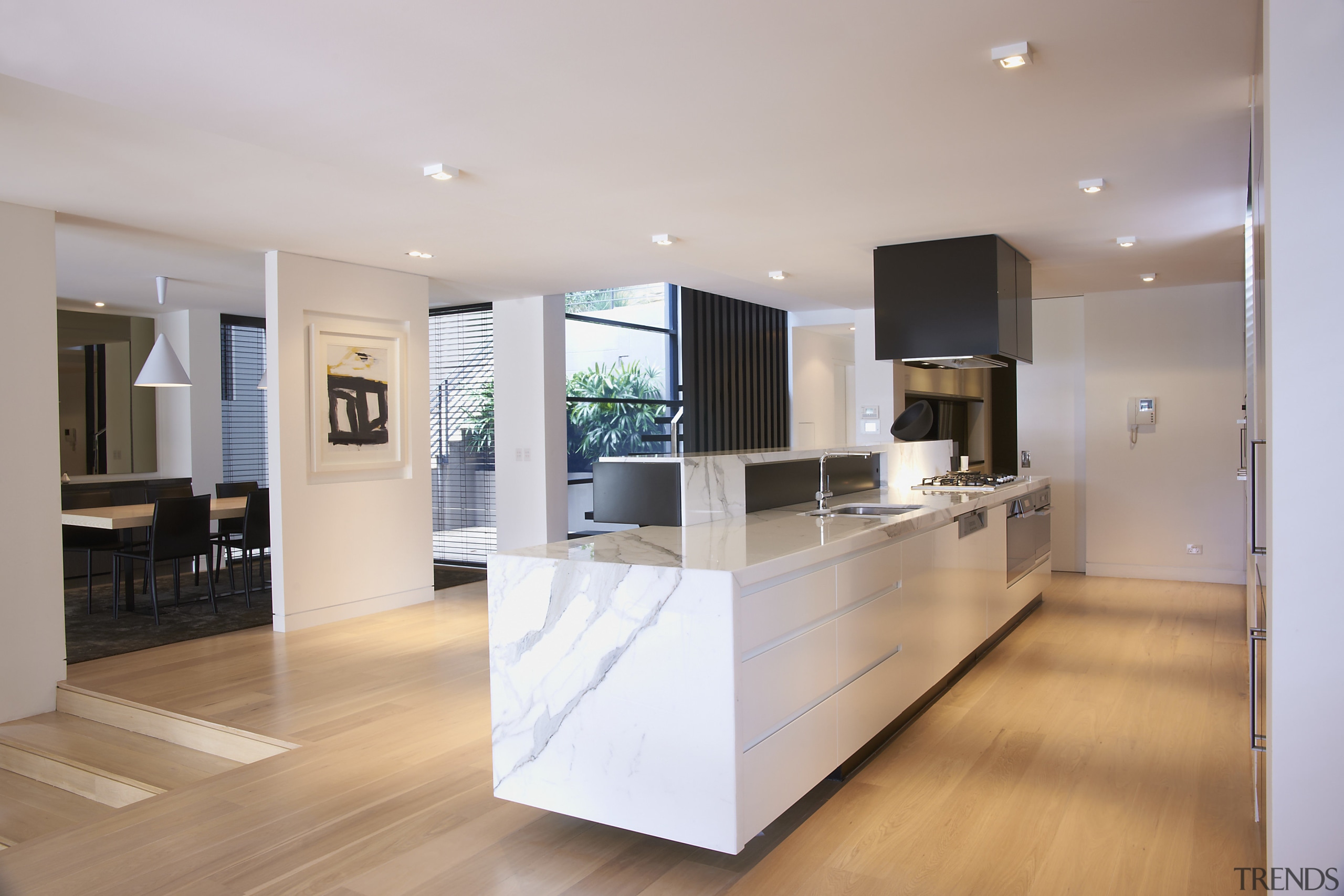 Kitchen designed by Michael Kilkeary. - Kitchen designed countertop, floor, flooring, interior design, kitchen, living room, real estate, room, wood flooring, gray