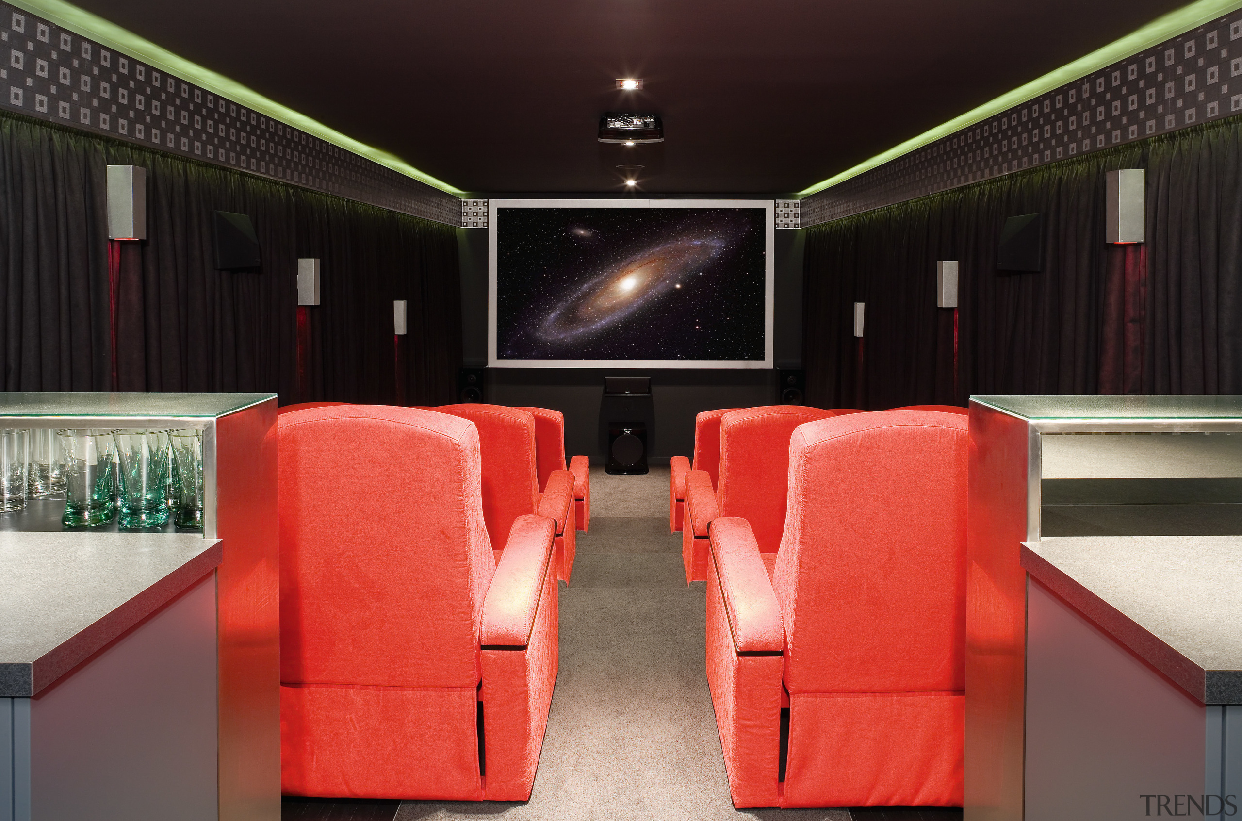 A view of this 12-seater theatre features its auditorium, interior design, black, red