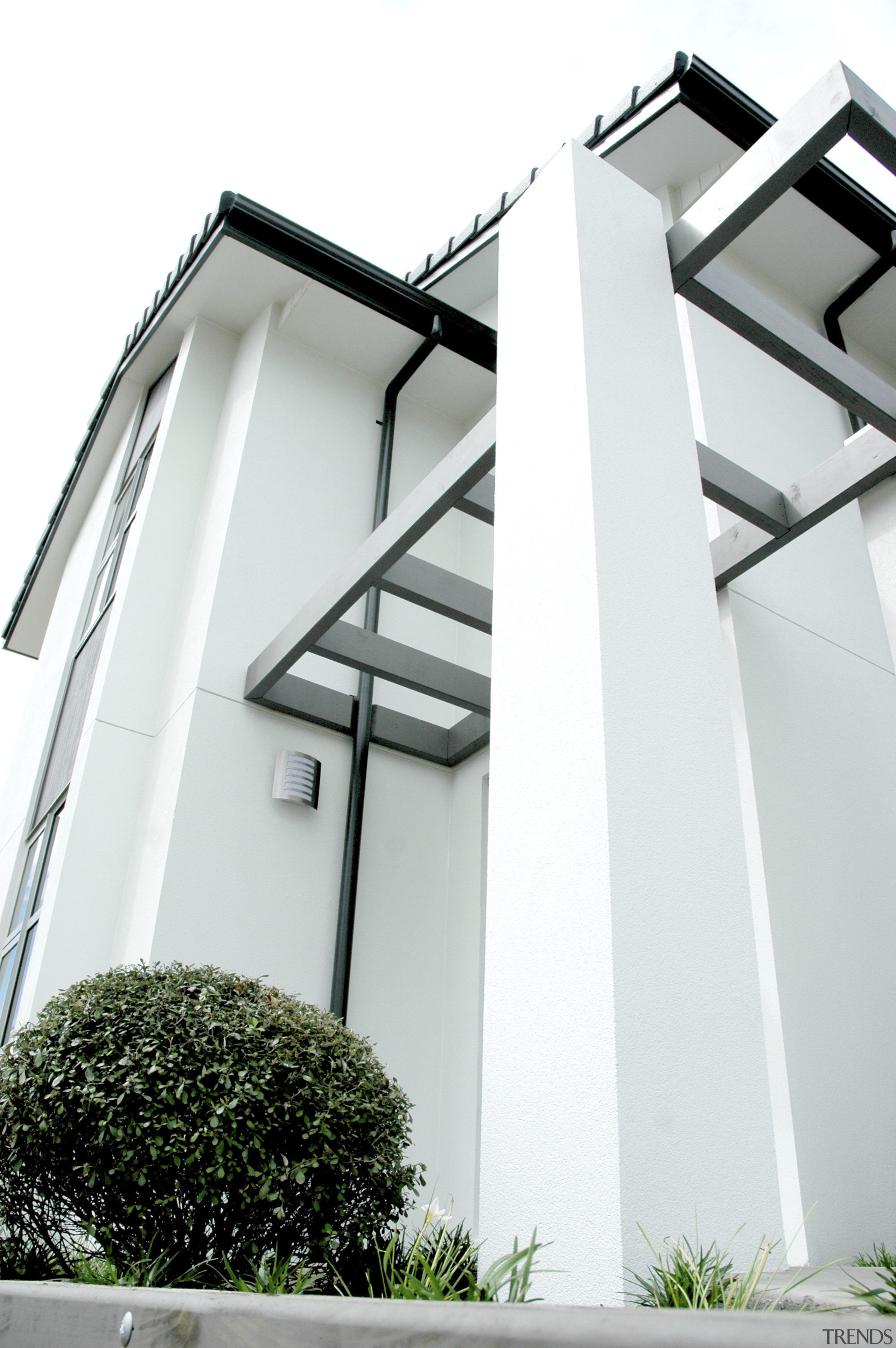 Exterior of single-storey house, dark stone cladding, and architecture, building, daylighting, facade, house, structure, window, white
