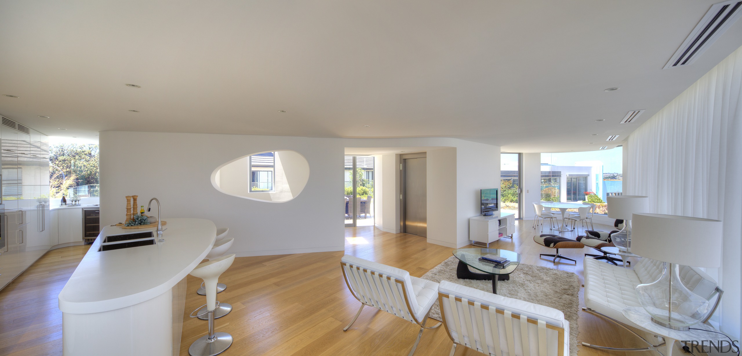 A two-tone colour scheme in this penthouse apartment apartment, architecture, ceiling, daylighting, dining room, estate, floor, home, house, interior design, living room, property, real estate, room, table, window, gray