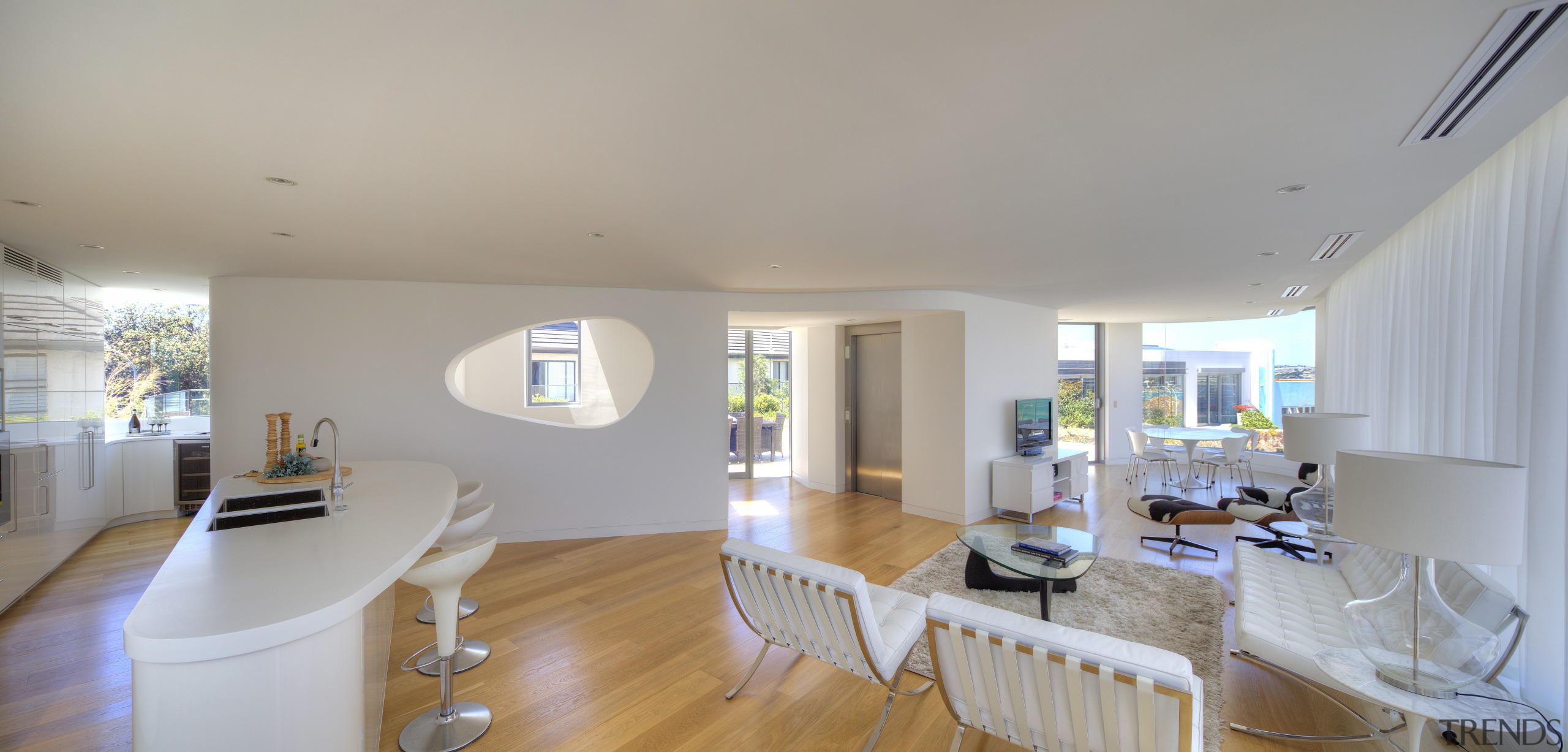 A two-tone colour scheme in this penthouse apartment apartment, architecture, ceiling, daylighting, dining room, estate, floor, home, house, interior design, living room, property, real estate, room, table, window, gray