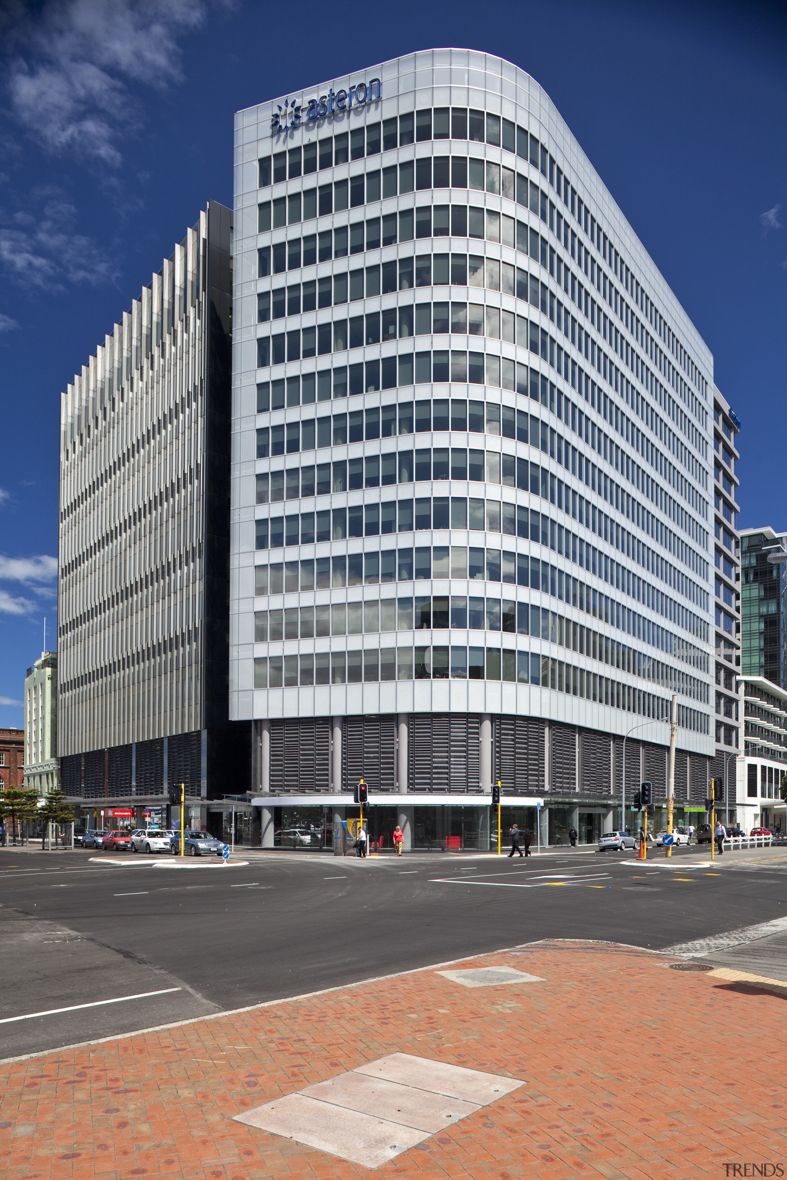 The Asteron Centre in Wellington, designed by Warren apartment, architecture, building, city, commercial building, condominium, corporate headquarters, daytime, downtown, facade, headquarters, landmark, metropolis, metropolitan area, mixed use, neighbourhood, plaza, real estate, residential area, sky, skyscraper, tower block, urban area, gray