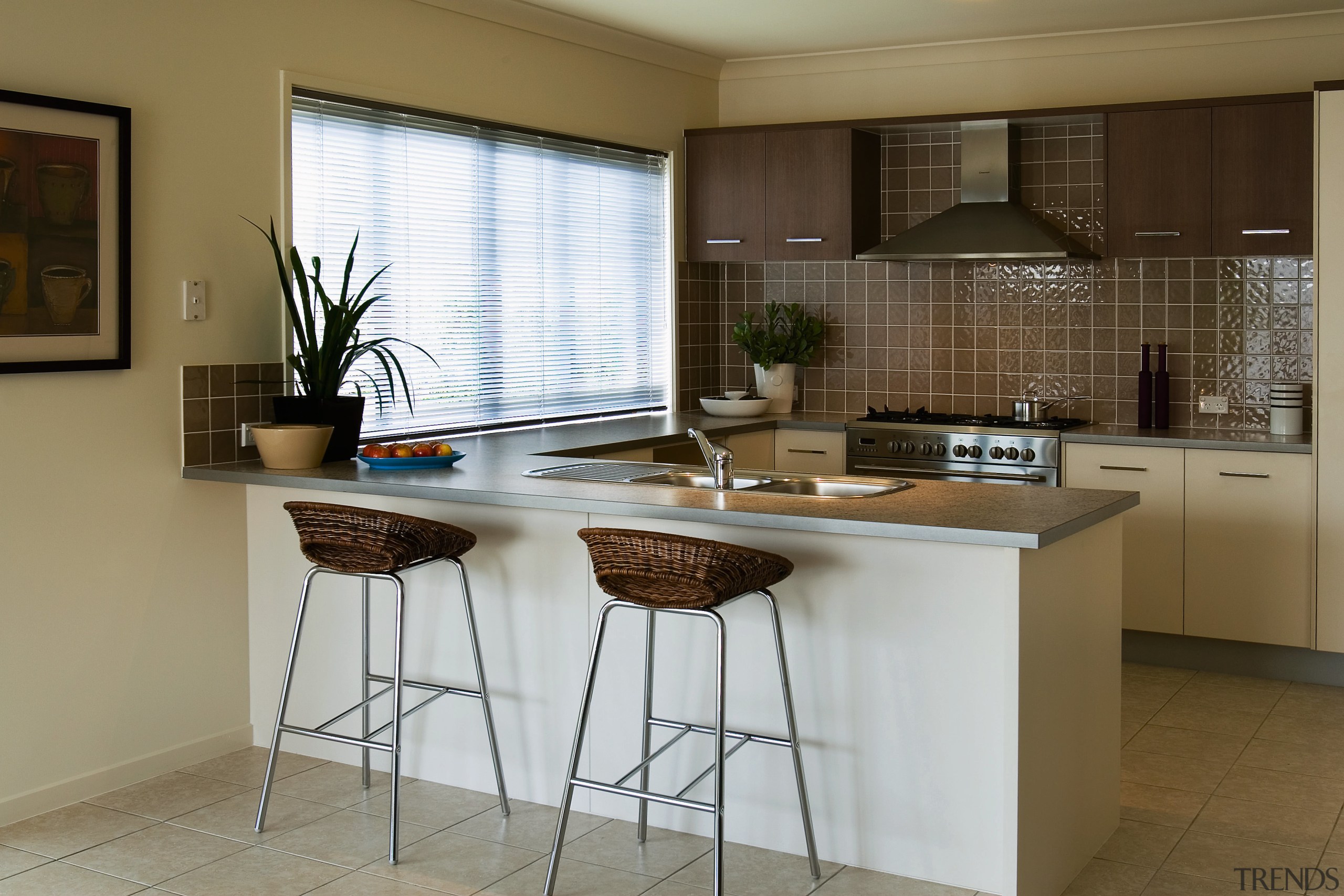 View of kitchen with cream and brown cabinetry, cabinetry, countertop, cuisine classique, interior design, kitchen, real estate, room, brown