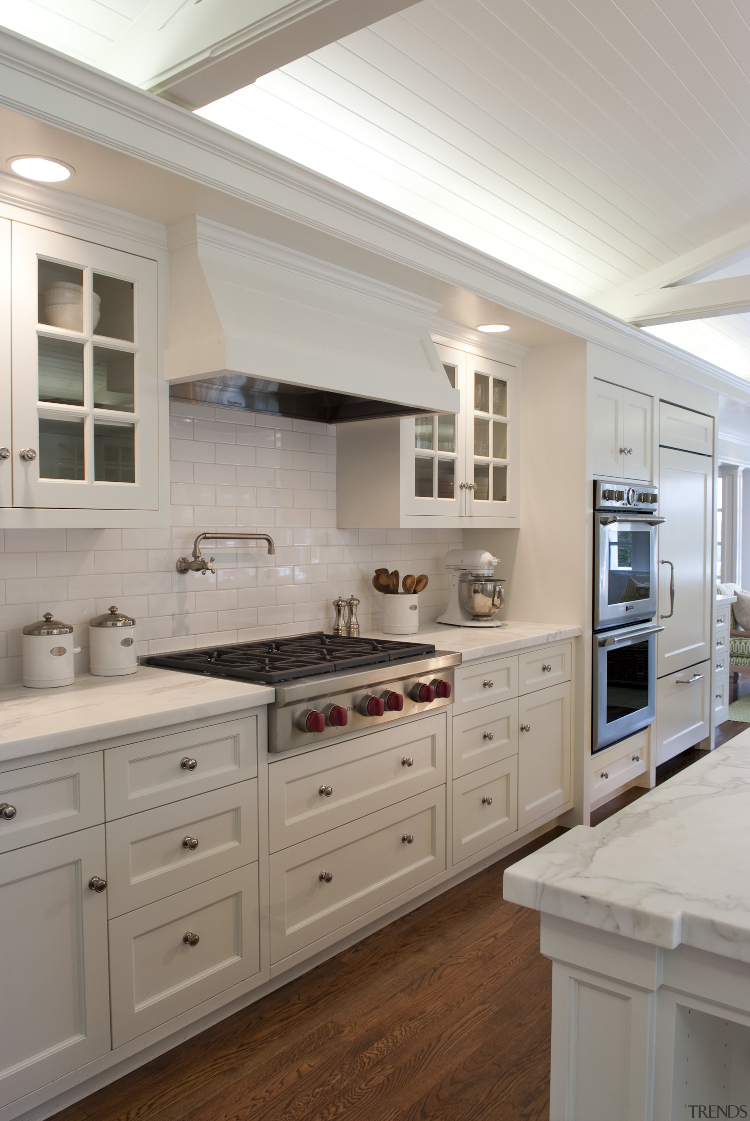 Subway tiles form the backsplash in this Cape cabinetry, countertop, cuisine classique, floor, home, interior design, kitchen, room, gray