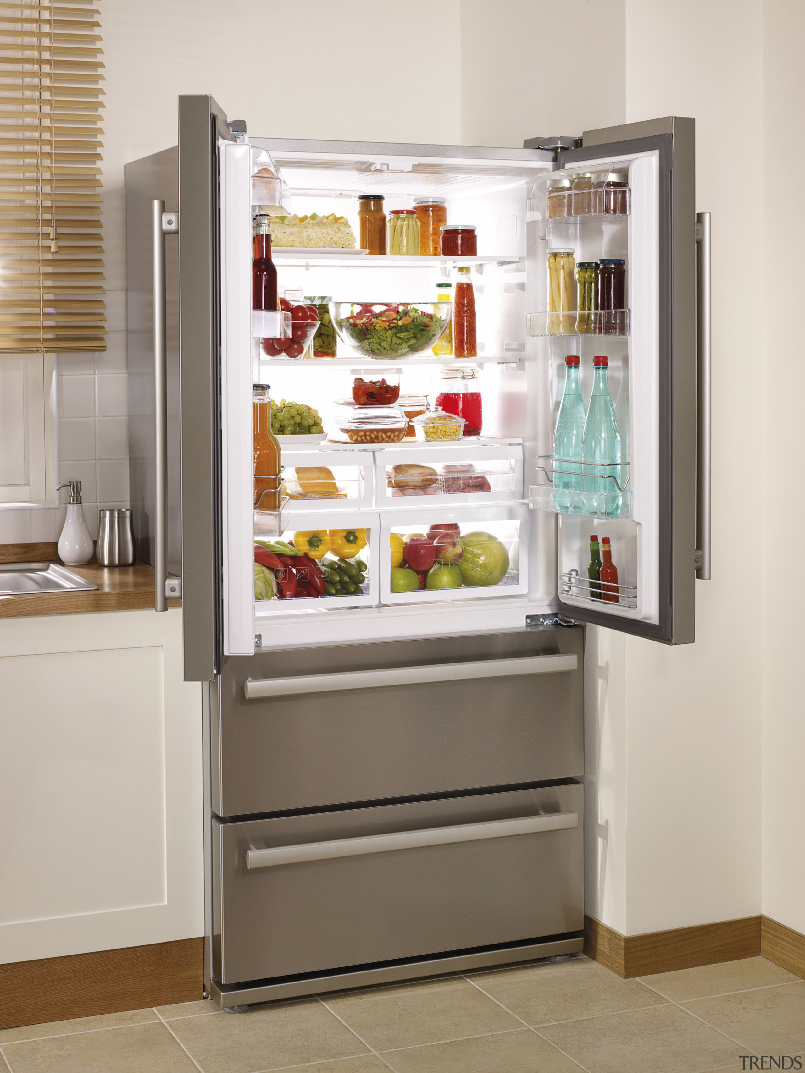 View of stainless fridge with doors open. - display case, home appliance, kitchen appliance, major appliance, refrigerator, shelf, shelving, white