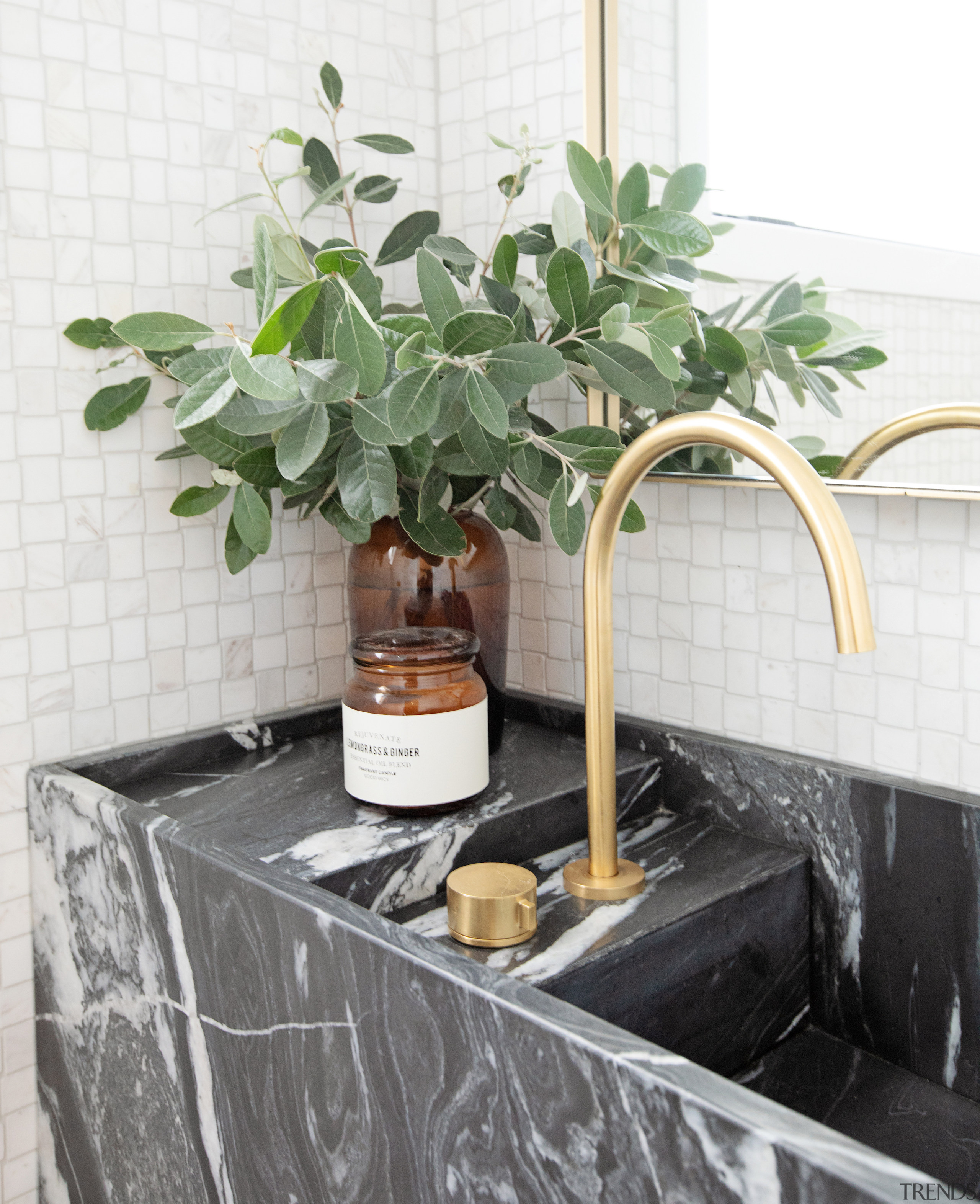 The powder room basin doubles as a luxury 