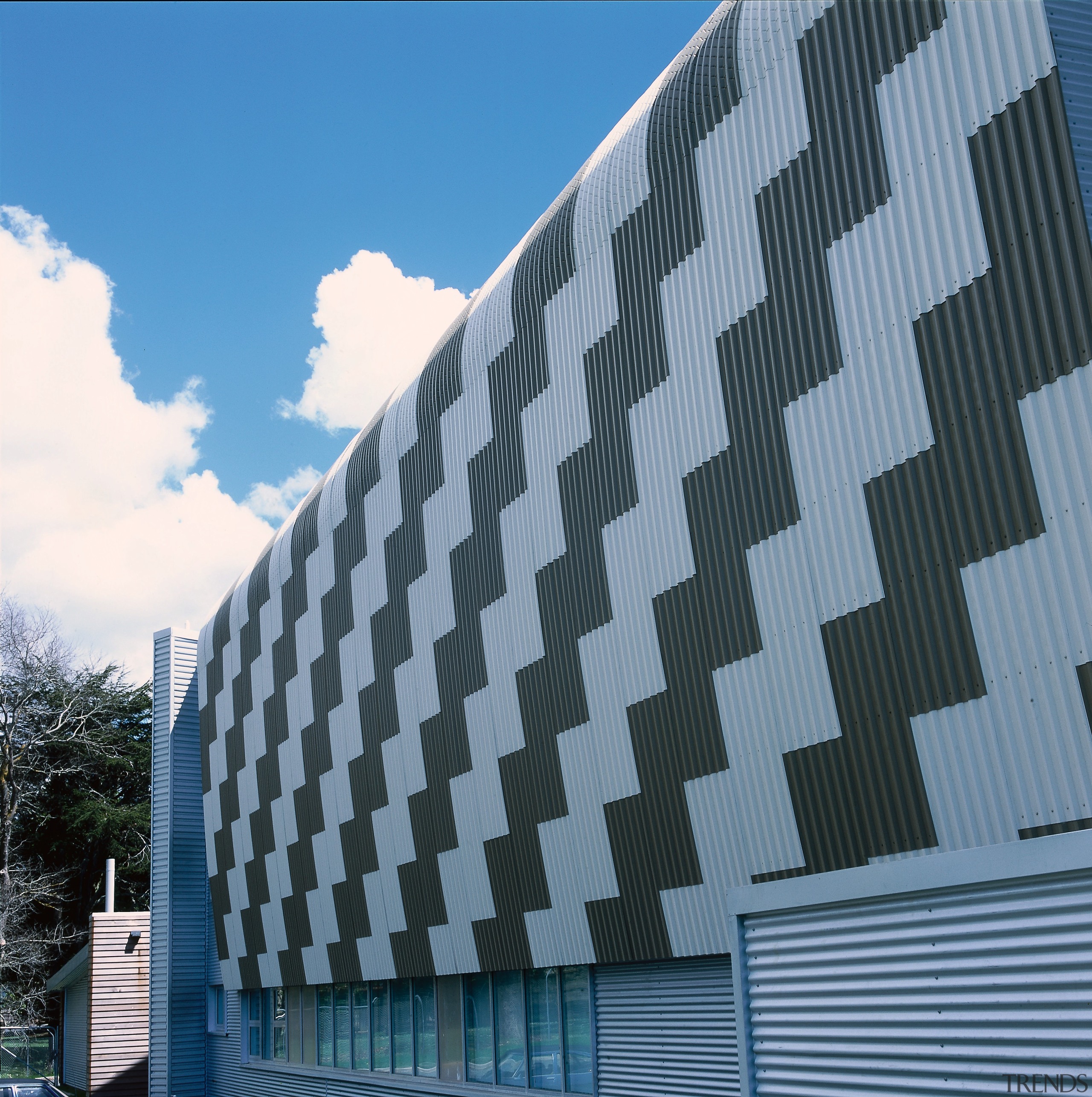 Exterior of building showing patterned design of steel architecture, building, commercial building, corporate headquarters, daylighting, daytime, facade, headquarters, landmark, metropolitan area, residential area, roof, sky, skyscraper, structure, tower block, teal, black