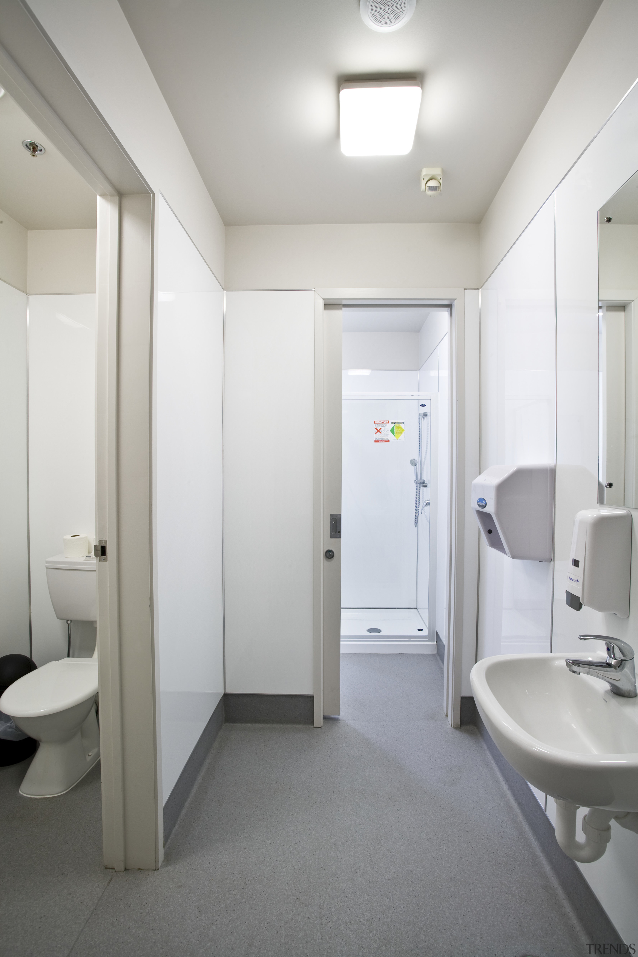 View of the school bathrooms where all the bathroom, interior design, plumbing fixture, product design, public toilet, room, toilet, white, gray