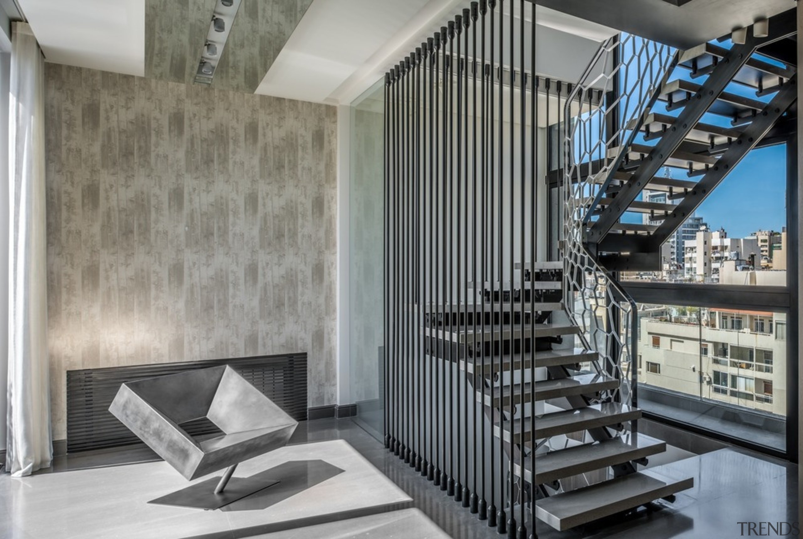 ​​​​​​​- "Cadre" noir Brutalist chair in steel with architecture, building, ceiling, design, floor, furniture, home, house, interior design, lobby, room, stairs, wall, gray