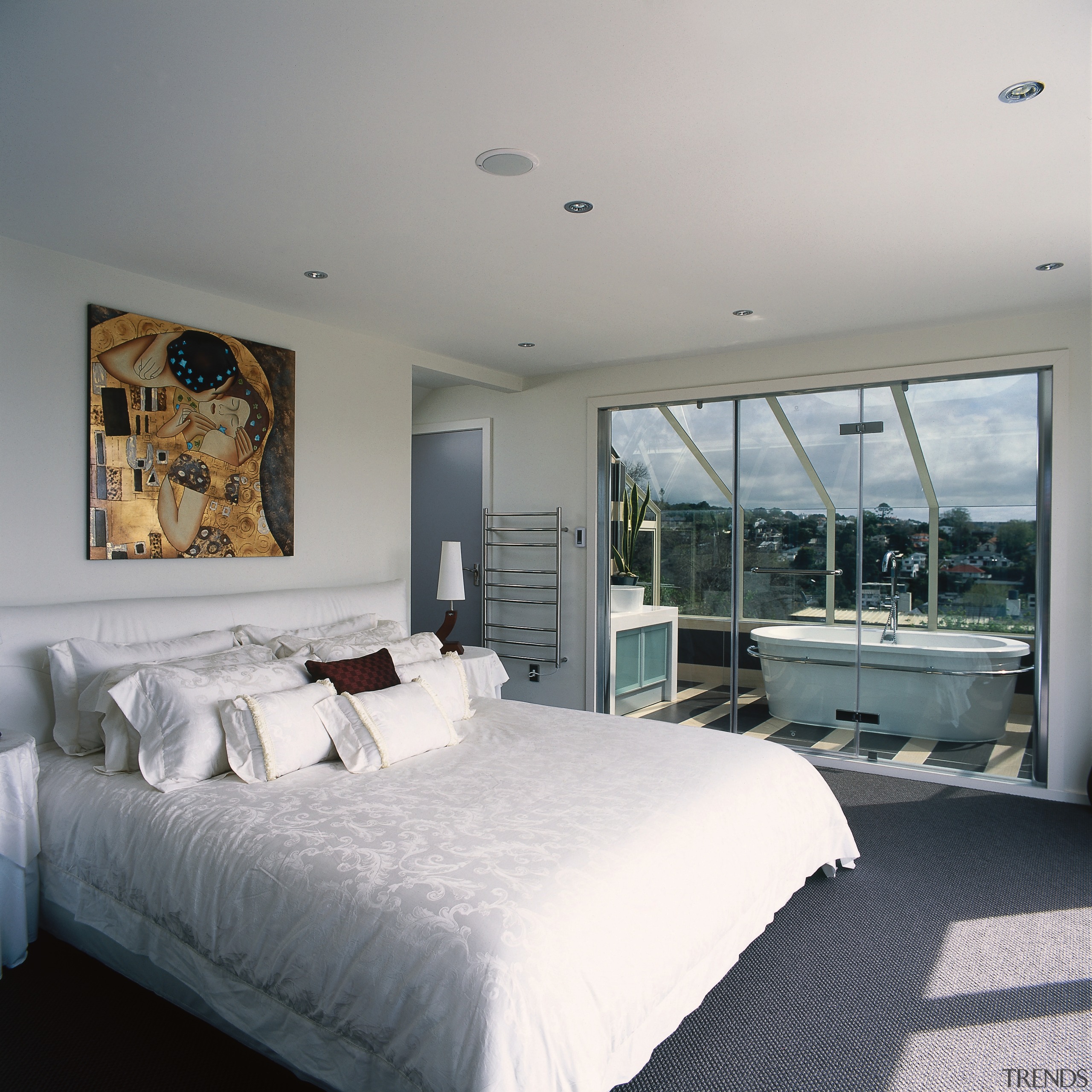 A view of the ensuite from the master architecture, bed frame, bedroom, ceiling, floor, home, house, interior design, property, real estate, room, wall, window, gray, white