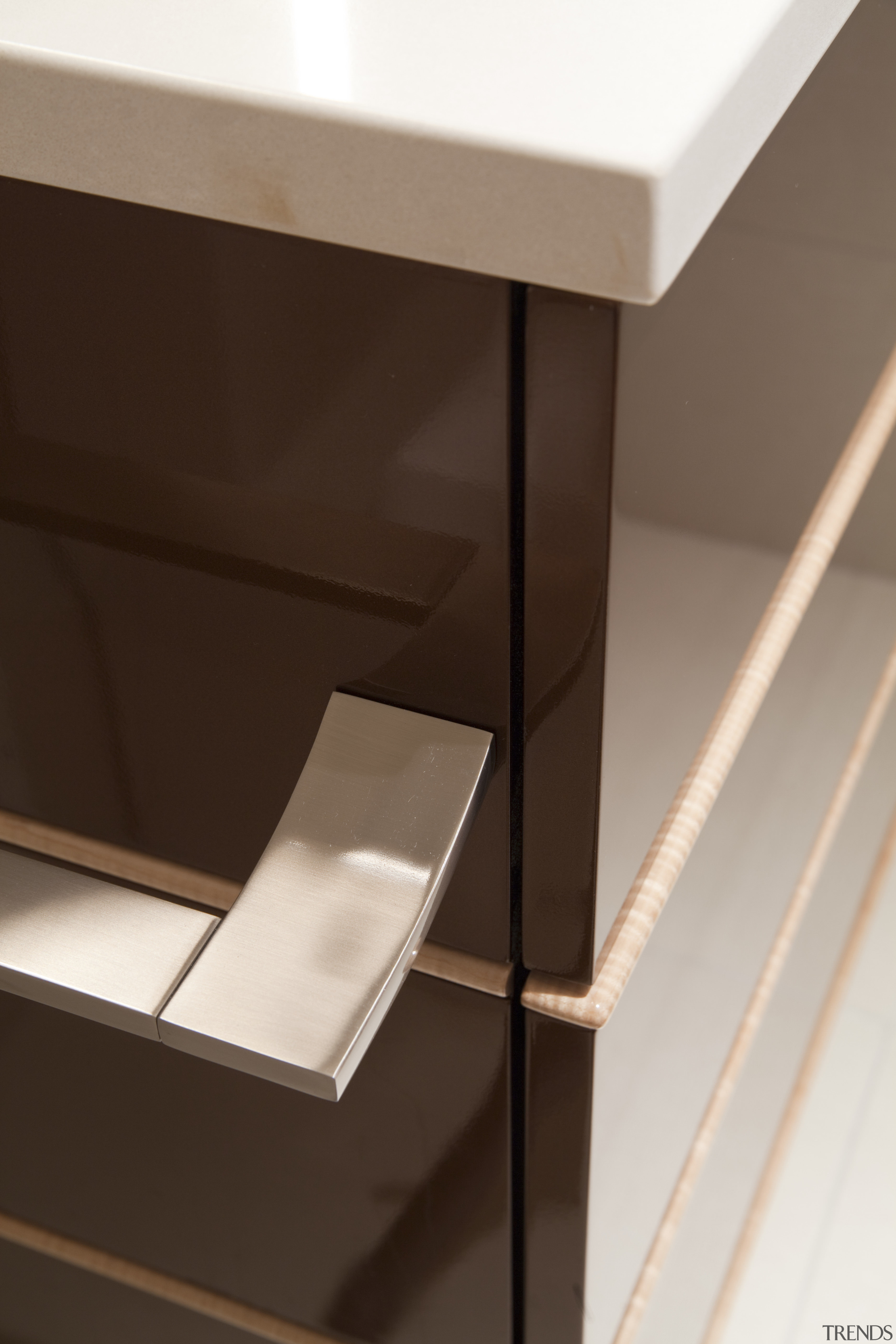 cabinetry in this remodeled bathroom  is done angle, chest of drawers, drawer, furniture, product design, shelf, sideboard, table, brown, white