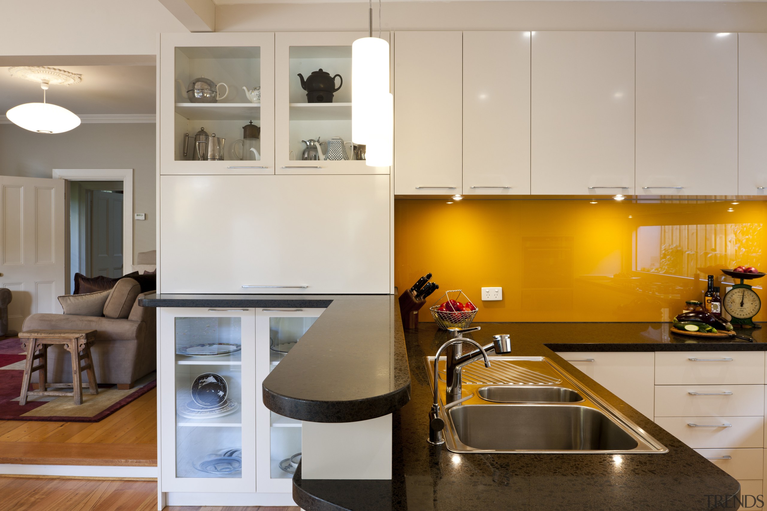 View of contemporary kitchen with white cabinetry, dark ceiling, countertop, interior design, kitchen, room, gray