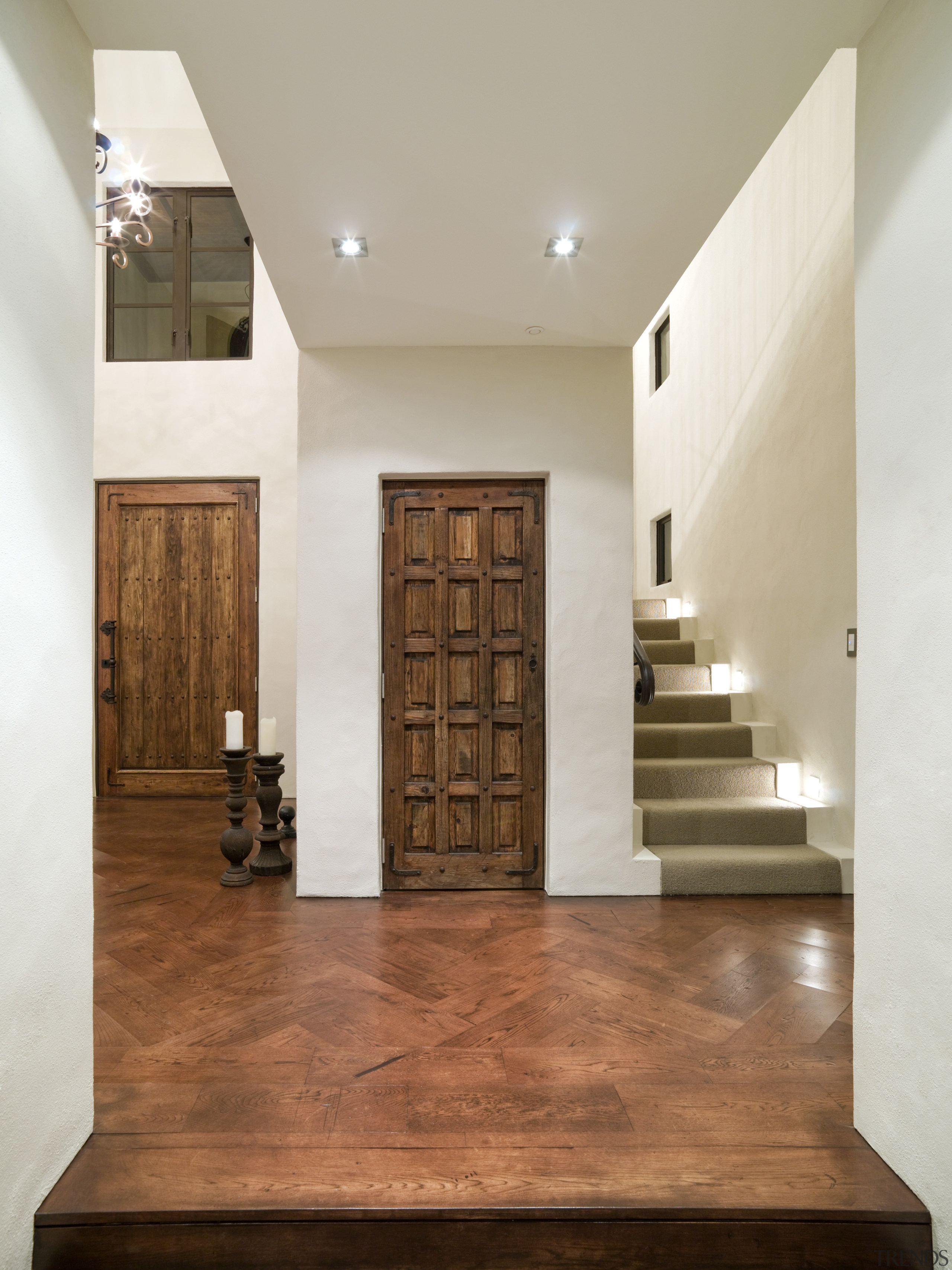 A view of a home designed by Masonry ceiling, estate, floor, flooring, hardwood, interior design, laminate flooring, lobby, property, stairs, tile, wall, wood, wood flooring, gray, brown