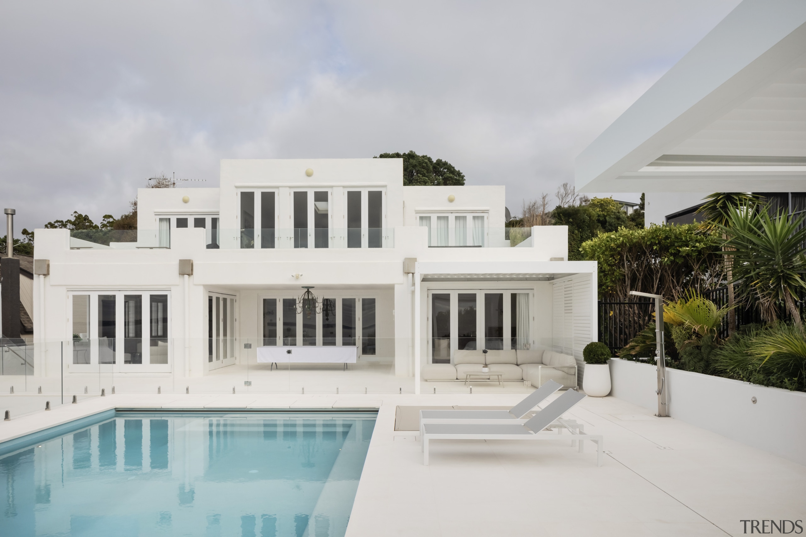 The pool and landscaping reflects a seamless flow 