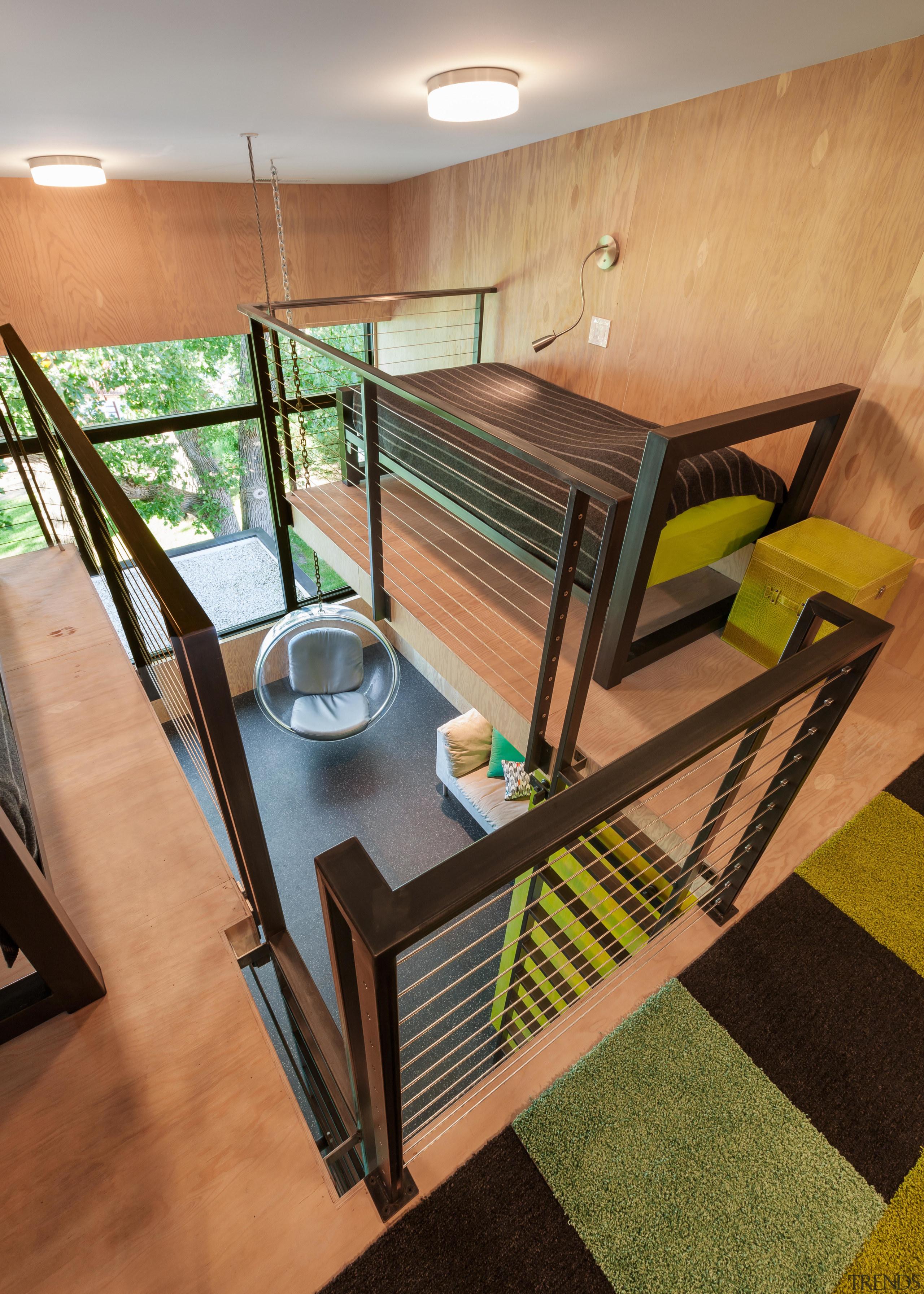 Fun for the kids – these double children’s floor, flooring, furniture, house, interior design, real estate, room, table, brown, orange