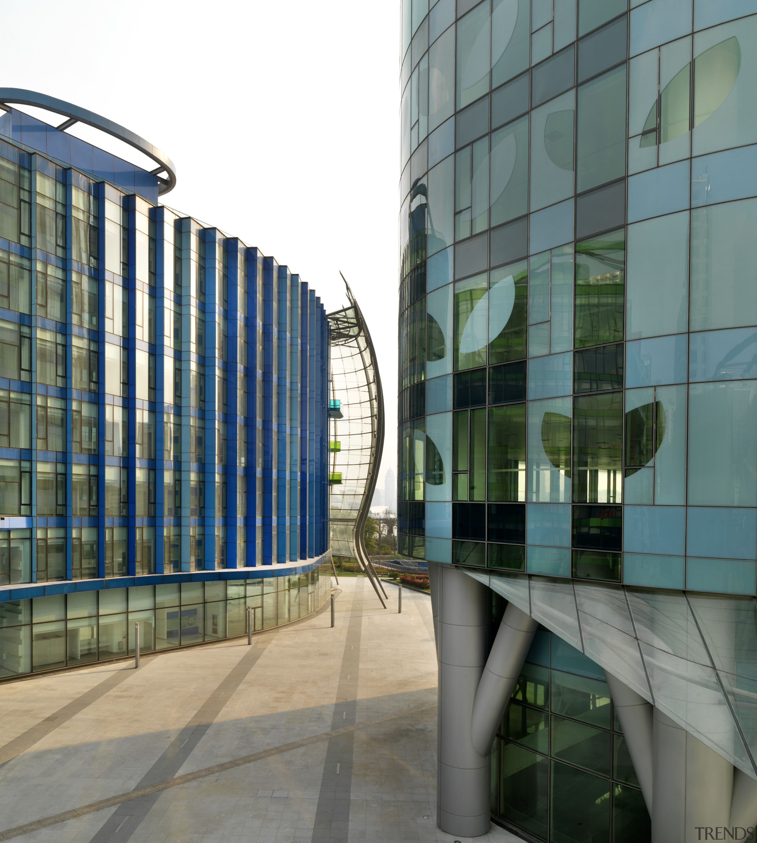 View of the Shanghai International Cruise Terminal. architecture, building, commercial building, condominium, corporate headquarters, daylighting, daytime, facade, glass, headquarters, metropolis, metropolitan area, mixed use, reflection, residential area, skyscraper, structure, tower block, urban area, gray