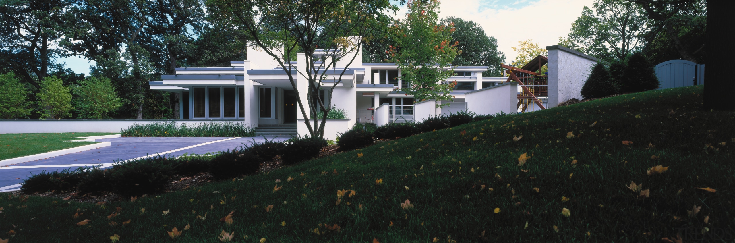 view of this architecturally designed house featuring  architecture, cottage, estate, grass, home, house, mansion, property, real estate, residential area, black