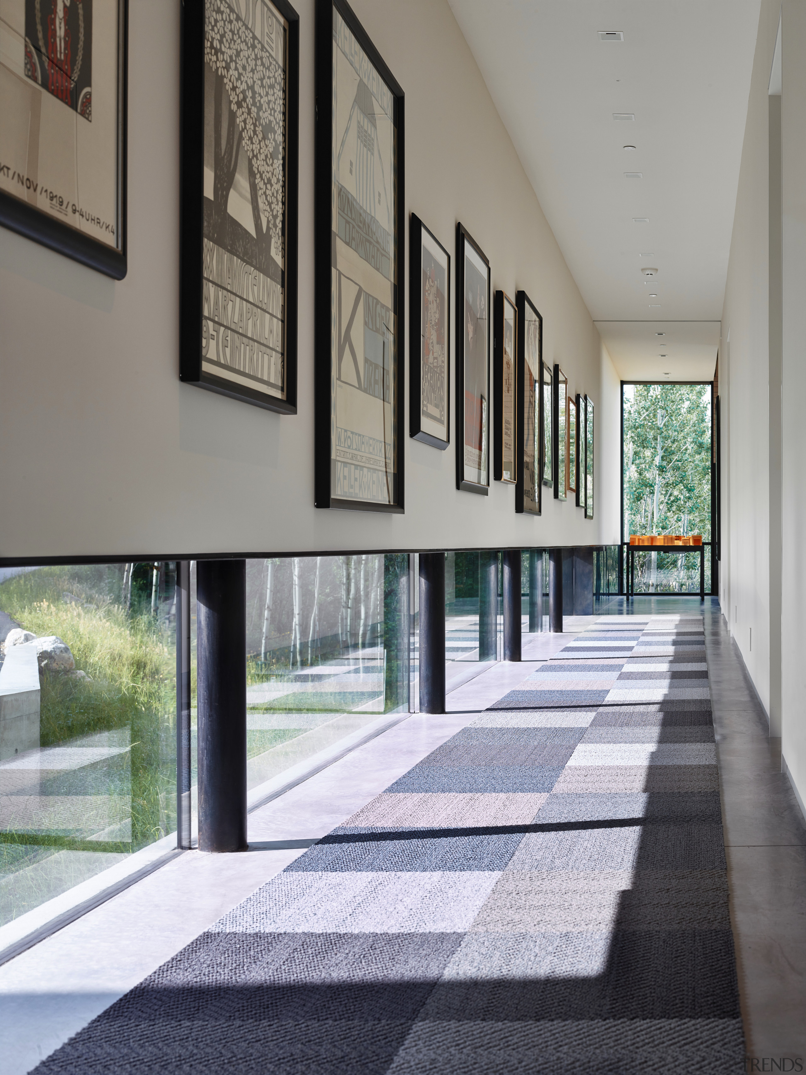 This passageway in the guest wing of a architecture, floor, flooring, house, interior design, real estate, window, gray