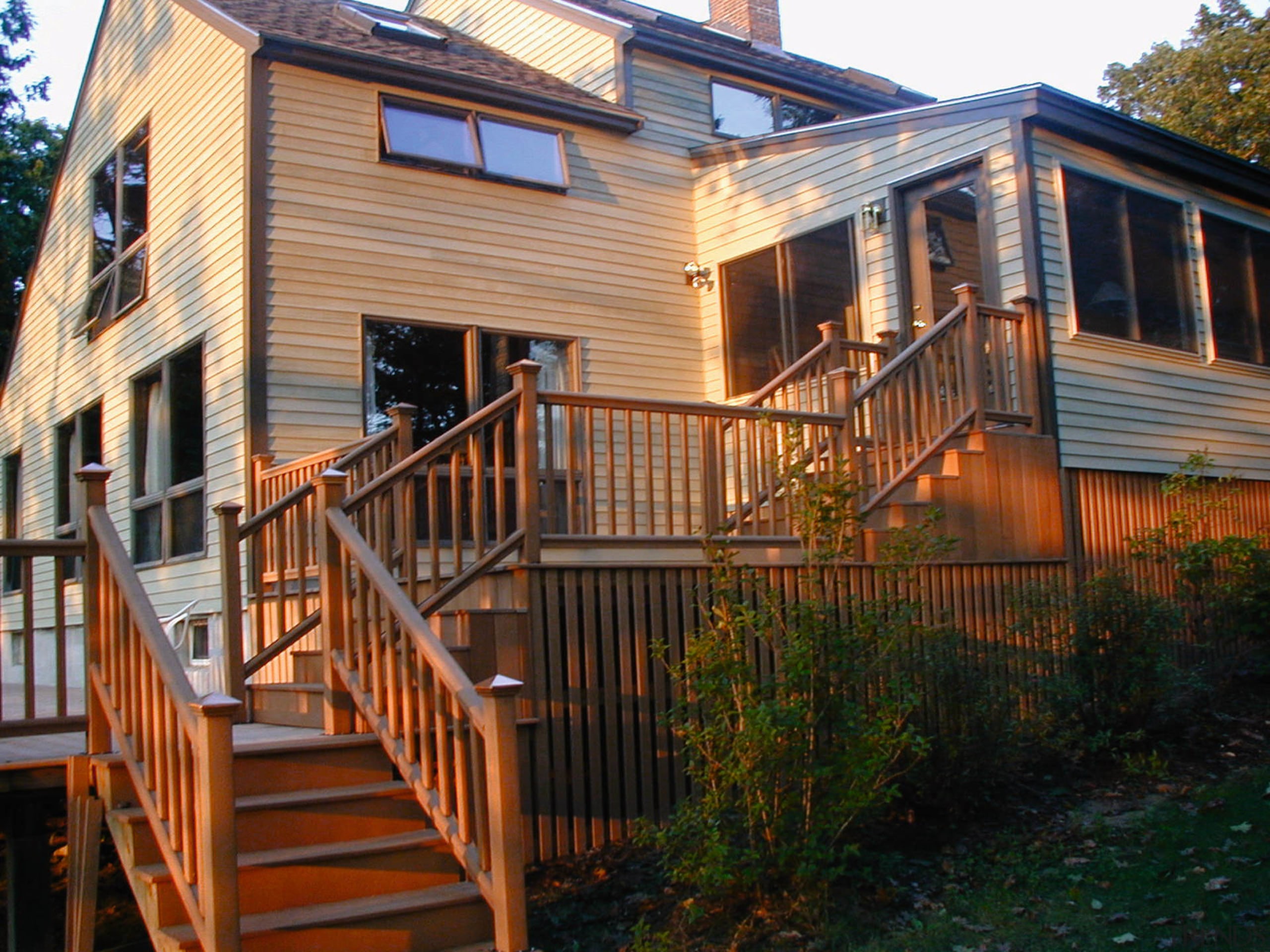 Exterior view of the wooden steps and decking cottage, deck, facade, handrail, home, house, log cabin, outdoor structure, porch, property, real estate, residential area, siding, stairs, brown, black