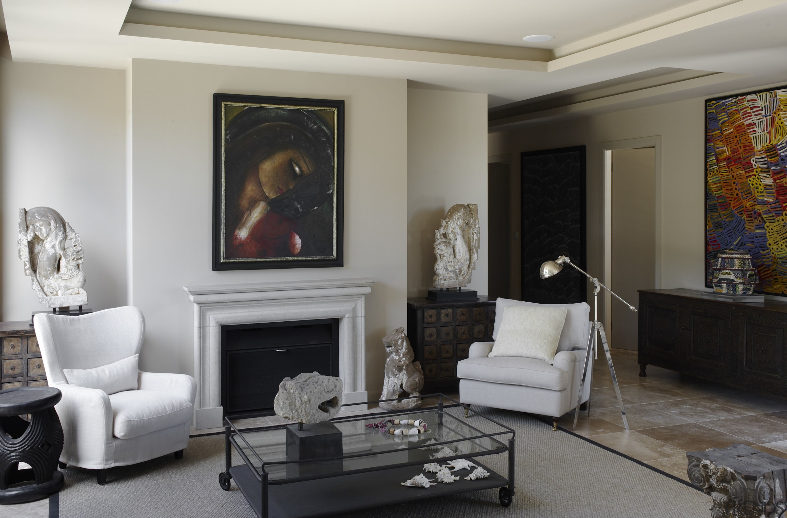Pale interior by designer Garth Barnett with coffered ceiling, furniture, hearth, home, interior design, living room, real estate, room, wall, gray, black