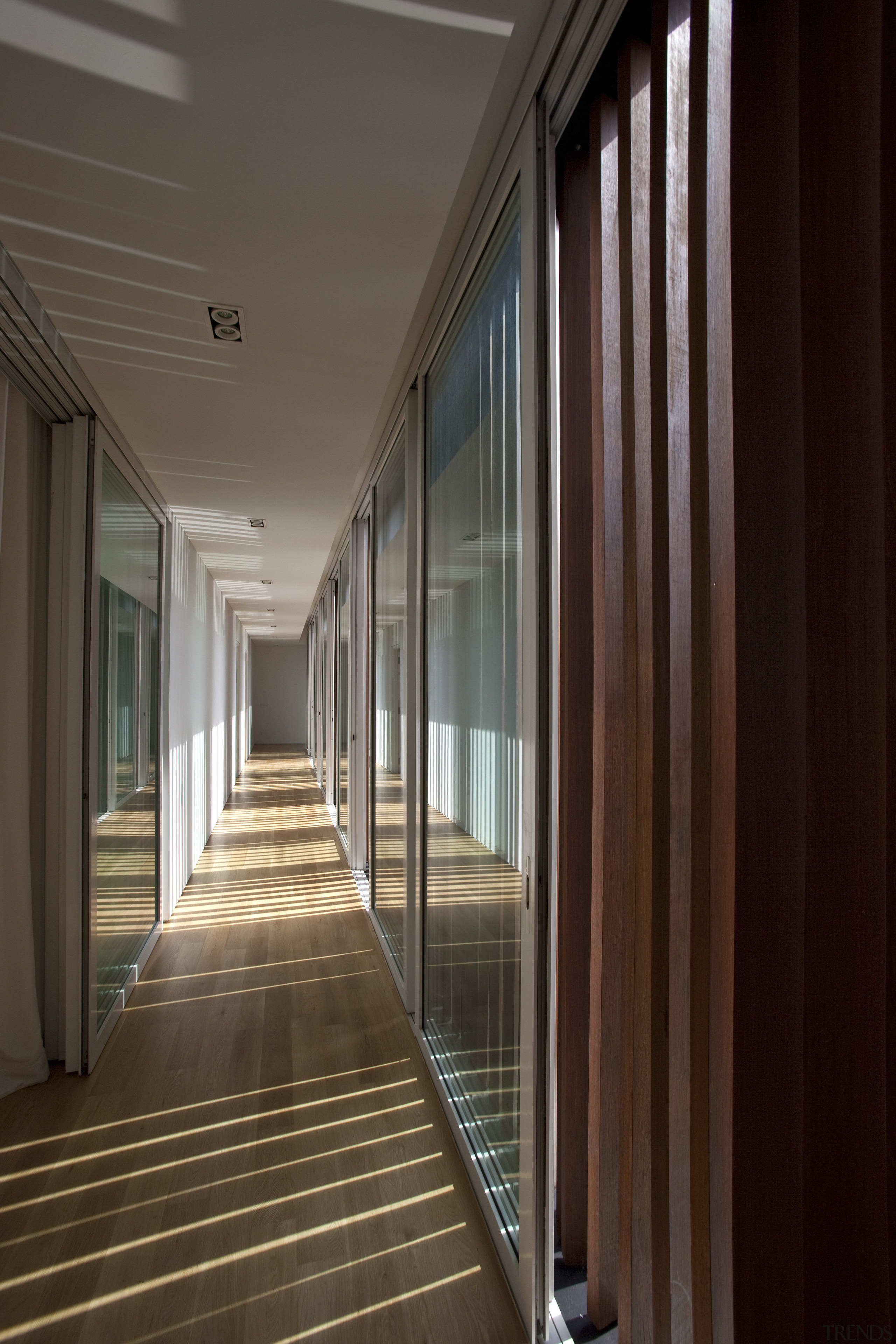 View of home designed by Wallflower Architecture &amp; architecture, daylighting, door, floor, flooring, house, interior design, lobby, real estate, structure, window, wood, brown, black