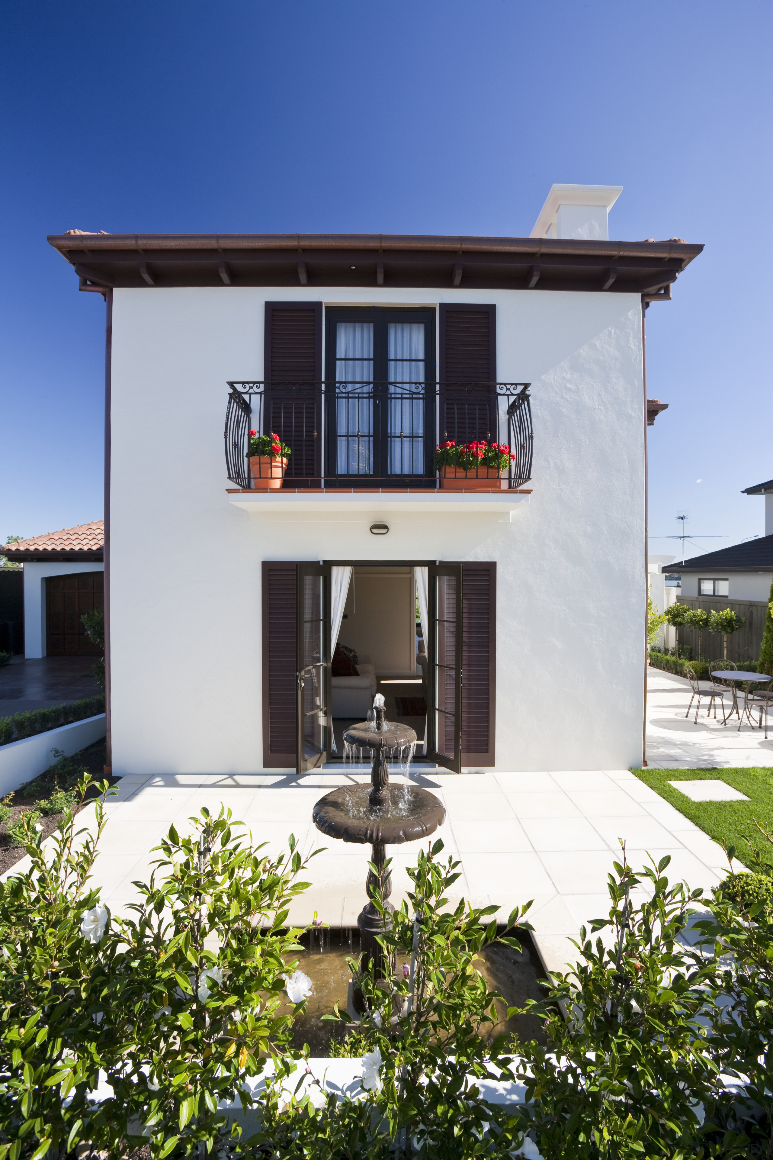 Exterior view of Eden Homes show home which architecture, building, facade, home, house, property, real estate, residential area, sky, villa, window